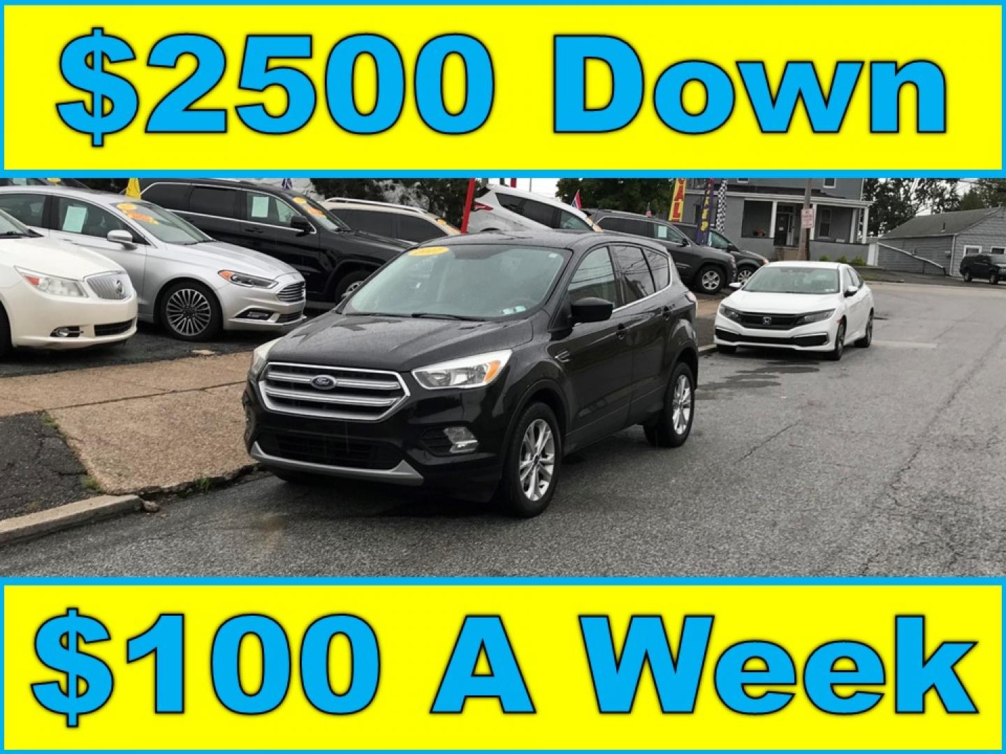 2017 Black /Black Ford Escape SE 4WD (1FMCU9G91HU) with an 2.0L L4 DOHC 16V engine, 6A transmission, located at 577 Chester Pike, Prospect Park, PA, 19076, (610) 237-1015, 39.886154, -75.302338 - 2017 Ford Escape SE: Great on gas, 4x4, backup camera, SUPER CLEAN, runs LIKE NEW! This vehicle comes inspected and has been given a bumper to bumper safety check. It is very clean, reliable, and well maintained. We offer a unique pay plan that is known for being the easiest and fastest financing- Photo#0