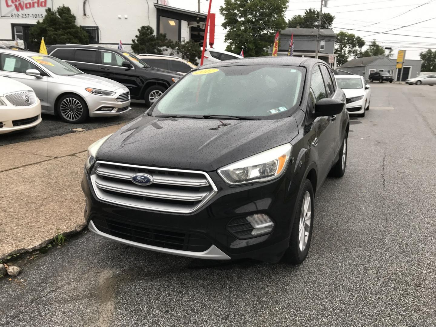 2017 Black /Black Ford Escape SE 4WD (1FMCU9G91HU) with an 2.0L L4 DOHC 16V engine, 6A transmission, located at 577 Chester Pike, Prospect Park, PA, 19076, (610) 237-1015, 39.886154, -75.302338 - 2017 Ford Escape SE: Great on gas, 4x4, backup camera, SUPER CLEAN, runs LIKE NEW! This vehicle comes inspected and has been given a bumper to bumper safety check. It is very clean, reliable, and well maintained. We offer a unique pay plan that is known for being the easiest and fastest financing- Photo#2