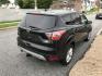 2017 Black /Black Ford Escape SE 4WD (1FMCU9G91HU) with an 2.0L L4 DOHC 16V engine, 6A transmission, located at 577 Chester Pike, Prospect Park, PA, 19076, (610) 237-1015, 39.886154, -75.302338 - 2017 Ford Escape SE: Great on gas, 4x4, backup camera, SUPER CLEAN, runs LIKE NEW! This vehicle comes inspected and has been given a bumper to bumper safety check. It is very clean, reliable, and well maintained. We offer a unique pay plan that is known for being the easiest and fastest financing- Photo#4