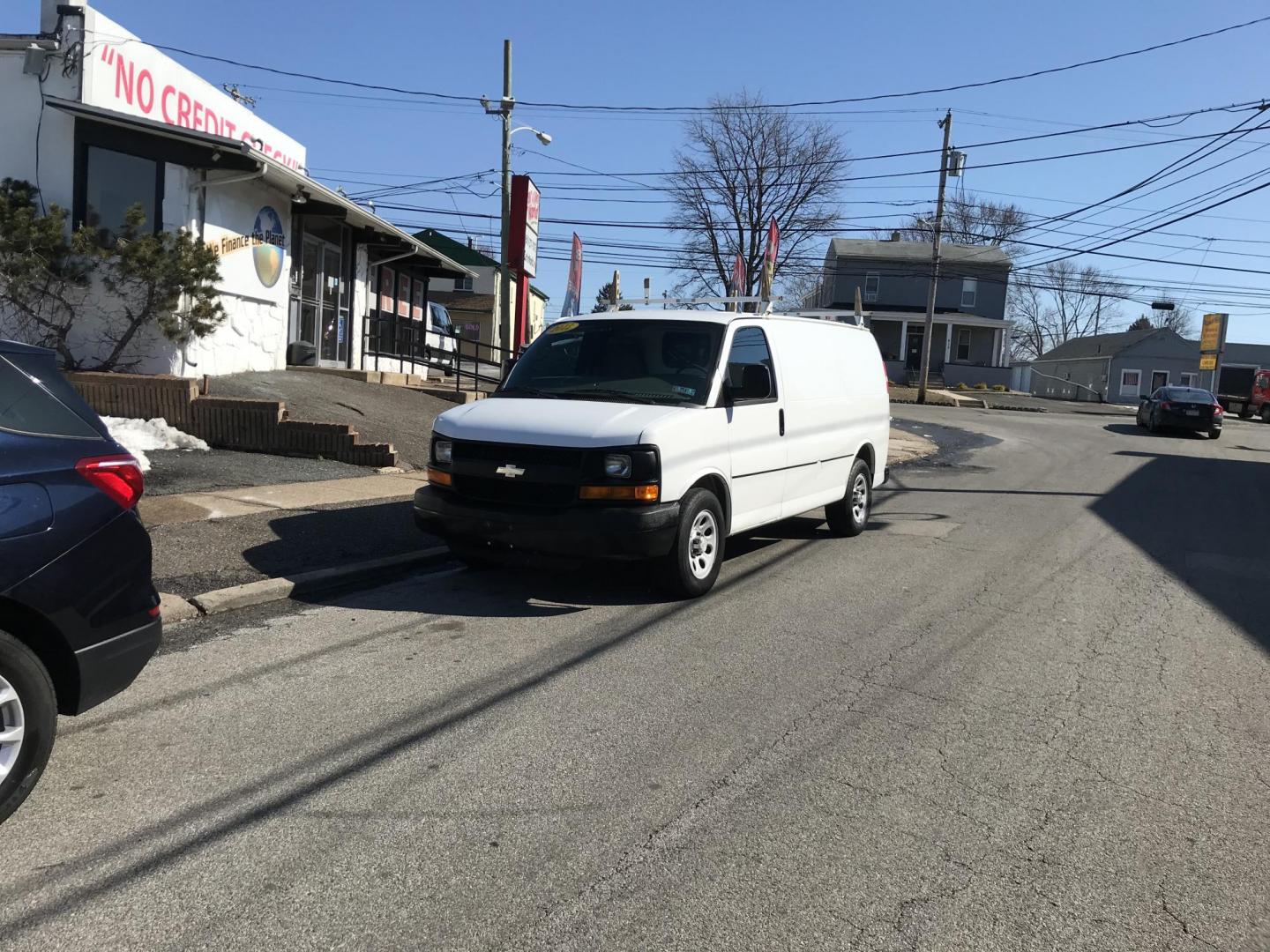 2012 White /Gray Chevrolet Express (1GCSGAFX2C1) with an 4.3 V6 engine, Automatic transmission, located at 577 Chester Pike, Prospect Park, PA, 19076, (610) 237-1015, 39.886154, -75.302338 - 2012 Chevrolet Express 1500 Cargo Van: Only 92k miles, shelving, new PA inspection, runs LIKE NEW! This vehicle comes inspected and has been given a bumper to bumper safety check. It is very clean, reliable, and well maintained. We offer a unique pay plan that is known for being the easiest and f - Photo#1