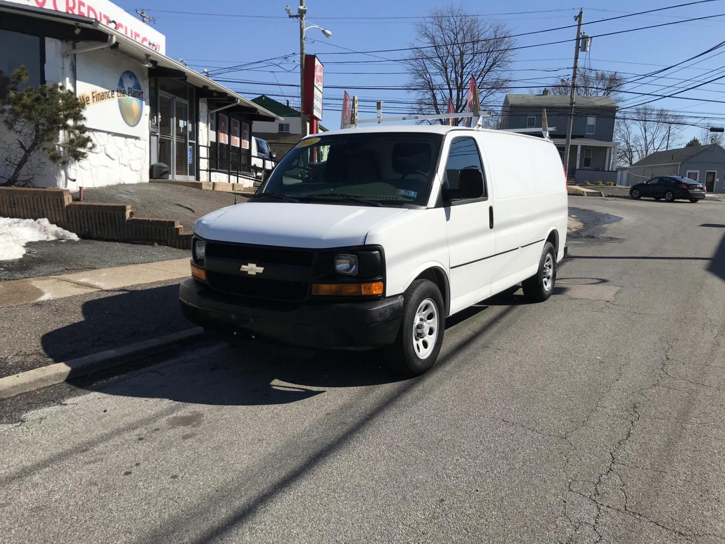 2012 White /Gray Chevrolet Express (1GCSGAFX2C1) with an 4.3 V6 engine, Automatic transmission, located at 577 Chester Pike, Prospect Park, PA, 19076, (610) 237-1015, 39.886154, -75.302338 - 2012 Chevrolet Express 1500 Cargo Van: Only 92k miles, shelving, new PA inspection, runs LIKE NEW! This vehicle comes inspected and has been given a bumper to bumper safety check. It is very clean, reliable, and well maintained. We offer a unique pay plan that is known for being the easiest and f - Photo#2