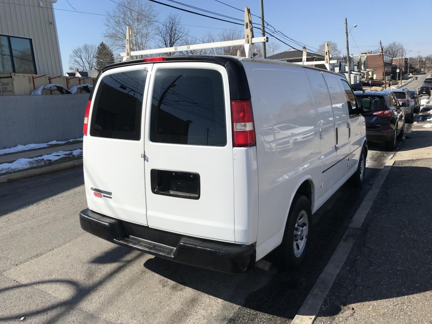 2012 White /Gray Chevrolet Express (1GCSGAFX2C1) with an 4.3 V6 engine, Automatic transmission, located at 577 Chester Pike, Prospect Park, PA, 19076, (610) 237-1015, 39.886154, -75.302338 - 2012 Chevrolet Express 1500 Cargo Van: Only 92k miles, shelving, new PA inspection, runs LIKE NEW! This vehicle comes inspected and has been given a bumper to bumper safety check. It is very clean, reliable, and well maintained. We offer a unique pay plan that is known for being the easiest and f - Photo#4