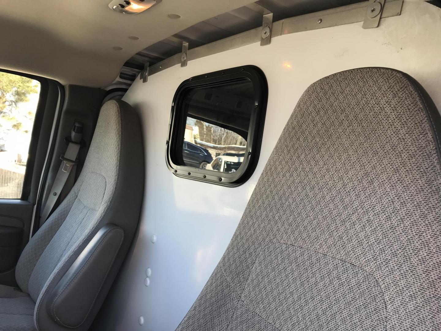 2012 White /Gray Chevrolet Express (1GCSGAFX2C1) with an 4.3 V6 engine, Automatic transmission, located at 577 Chester Pike, Prospect Park, PA, 19076, (610) 237-1015, 39.886154, -75.302338 - 2012 Chevrolet Express 1500 Cargo Van: Only 92k miles, shelving, new PA inspection, runs LIKE NEW! This vehicle comes inspected and has been given a bumper to bumper safety check. It is very clean, reliable, and well maintained. We offer a unique pay plan that is known for being the easiest and f - Photo#9