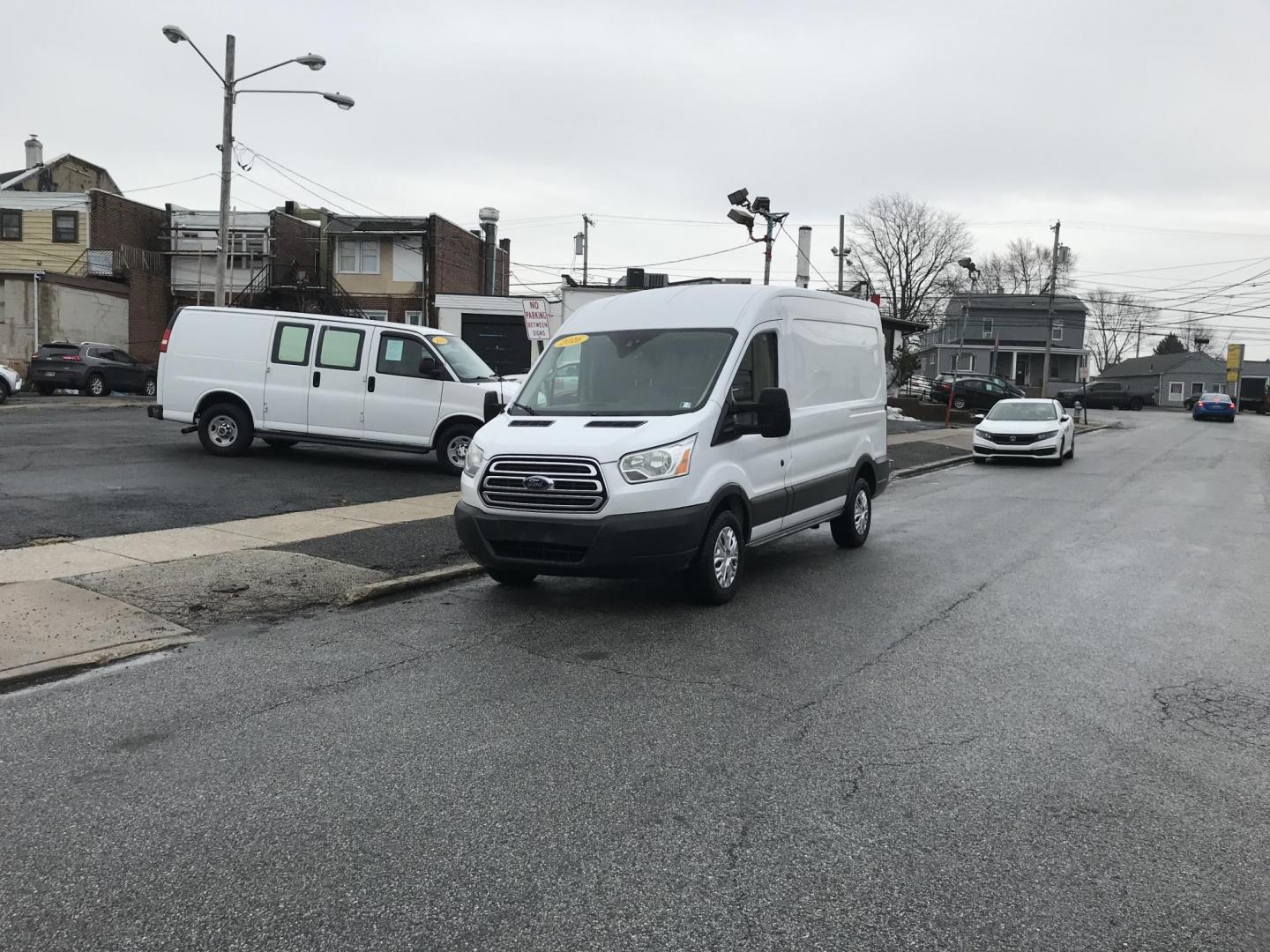 2016 White /Gray Ford Transit 250 Van Med. Roof w/Sliding Pass. 130-in. WB (1FTYR1CM9GK) with an 3.7L V6 DOHC 24V engine, 6A transmission, located at 577 Chester Pike, Prospect Park, PA, 19076, (610) 237-1015, 39.886154, -75.302338 - 2016 Ford Transit 250 Medium Roof: Has multiple pieces of shelving, backup camera, new PA inspection, FLEET MAINTAINED! This vehicle comes inspected and has been given a bumper to bumper safety check. It is very clean, reliable, and well maintained. We offer a unique pay plan that is known for be - Photo#1