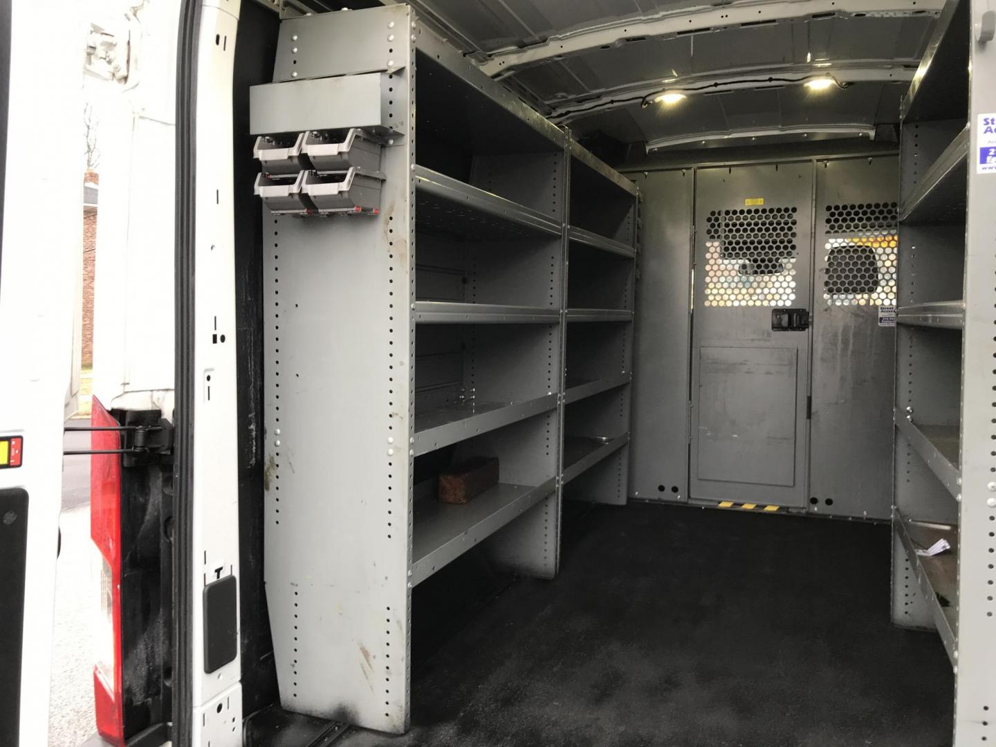 2016 White /Gray Ford Transit 250 Van Med. Roof w/Sliding Pass. 130-in. WB (1FTYR1CM9GK) with an 3.7L V6 DOHC 24V engine, 6A transmission, located at 577 Chester Pike, Prospect Park, PA, 19076, (610) 237-1015, 39.886154, -75.302338 - 2016 Ford Transit 250 Medium Roof: Has multiple pieces of shelving, backup camera, new PA inspection, FLEET MAINTAINED! This vehicle comes inspected and has been given a bumper to bumper safety check. It is very clean, reliable, and well maintained. We offer a unique pay plan that is known for be - Photo#17