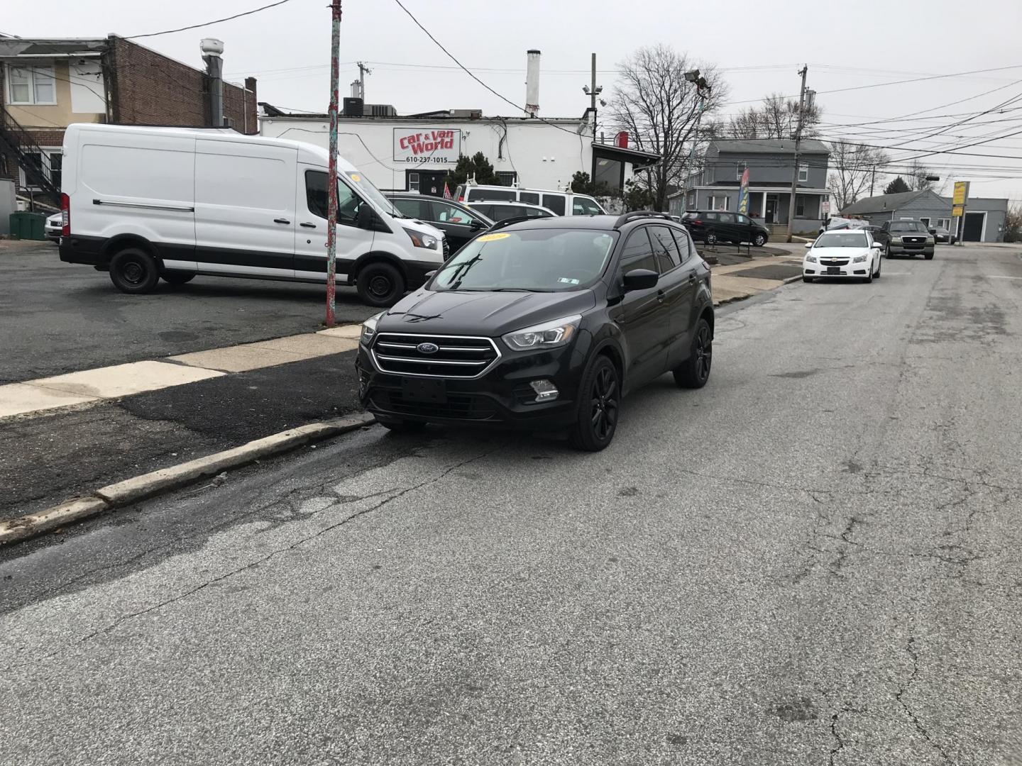 2019 Black /Black Ford Escape SE 4WD (1FMCU9GD9KU) with an 1.5L L4 DOHC 16V engine, 6A transmission, located at 577 Chester Pike, Prospect Park, PA, 19076, (610) 237-1015, 39.886154, -75.302338 - Photo#1