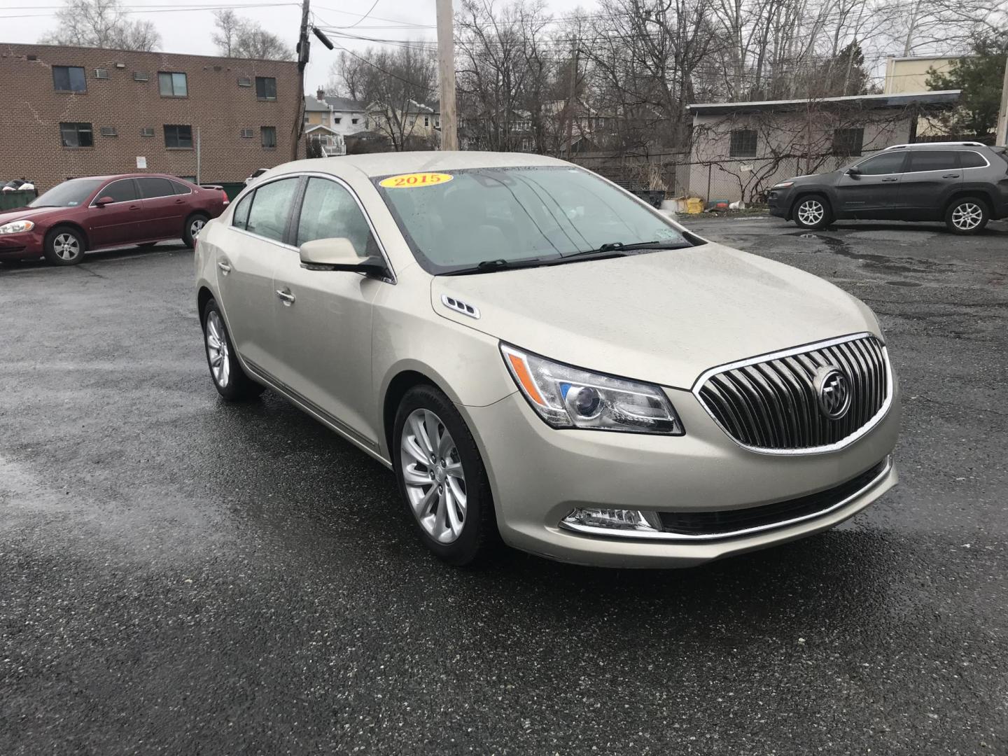 2015 Gold /Tan Buick LaCrosse Leather Package (1G4GB5G30FF) with an 3.6L V6 DOHC 24V FFV engine, 6-Speed Automatic transmission, located at 577 Chester Pike, Prospect Park, PA, 19076, (610) 237-1015, 39.886154, -75.302338 - Photo#2