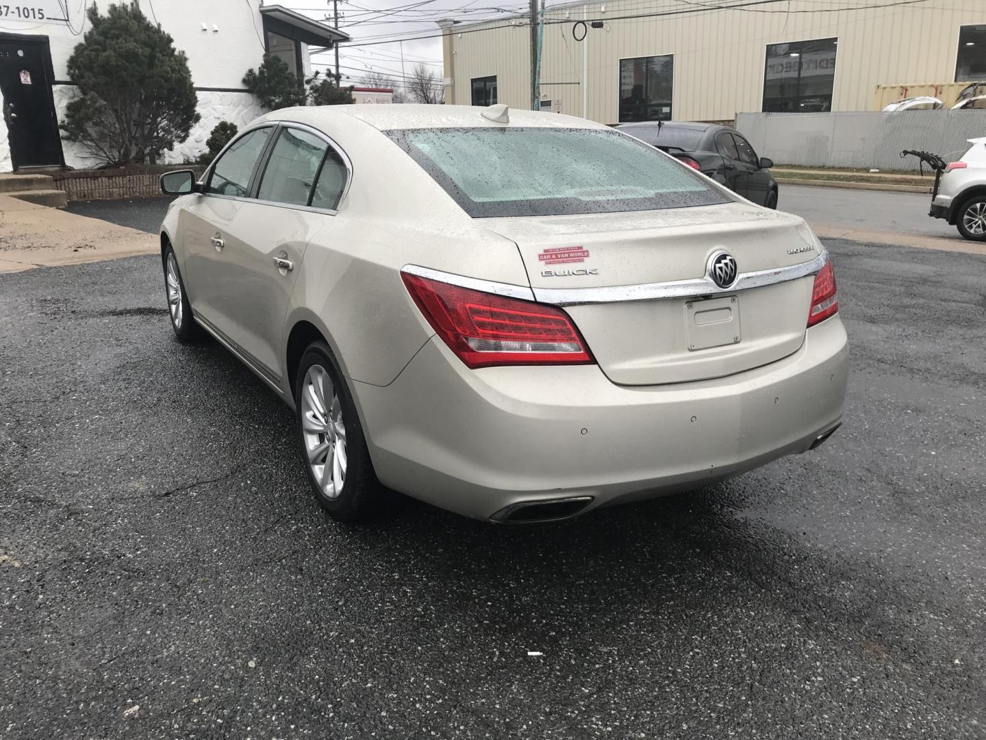 2015 Gold /Tan Buick LaCrosse Leather Package (1G4GB5G30FF) with an 3.6L V6 DOHC 24V FFV engine, 6-Speed Automatic transmission, located at 577 Chester Pike, Prospect Park, PA, 19076, (610) 237-1015, 39.886154, -75.302338 - Photo#5