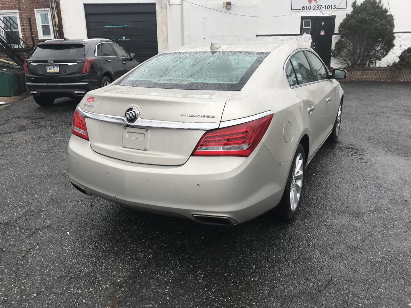 2015 Gold /Tan Buick LaCrosse Leather Package (1G4GB5G30FF) with an 3.6L V6 DOHC 24V FFV engine, 6-Speed Automatic transmission, located at 577 Chester Pike, Prospect Park, PA, 19076, (610) 237-1015, 39.886154, -75.302338 - Photo#6