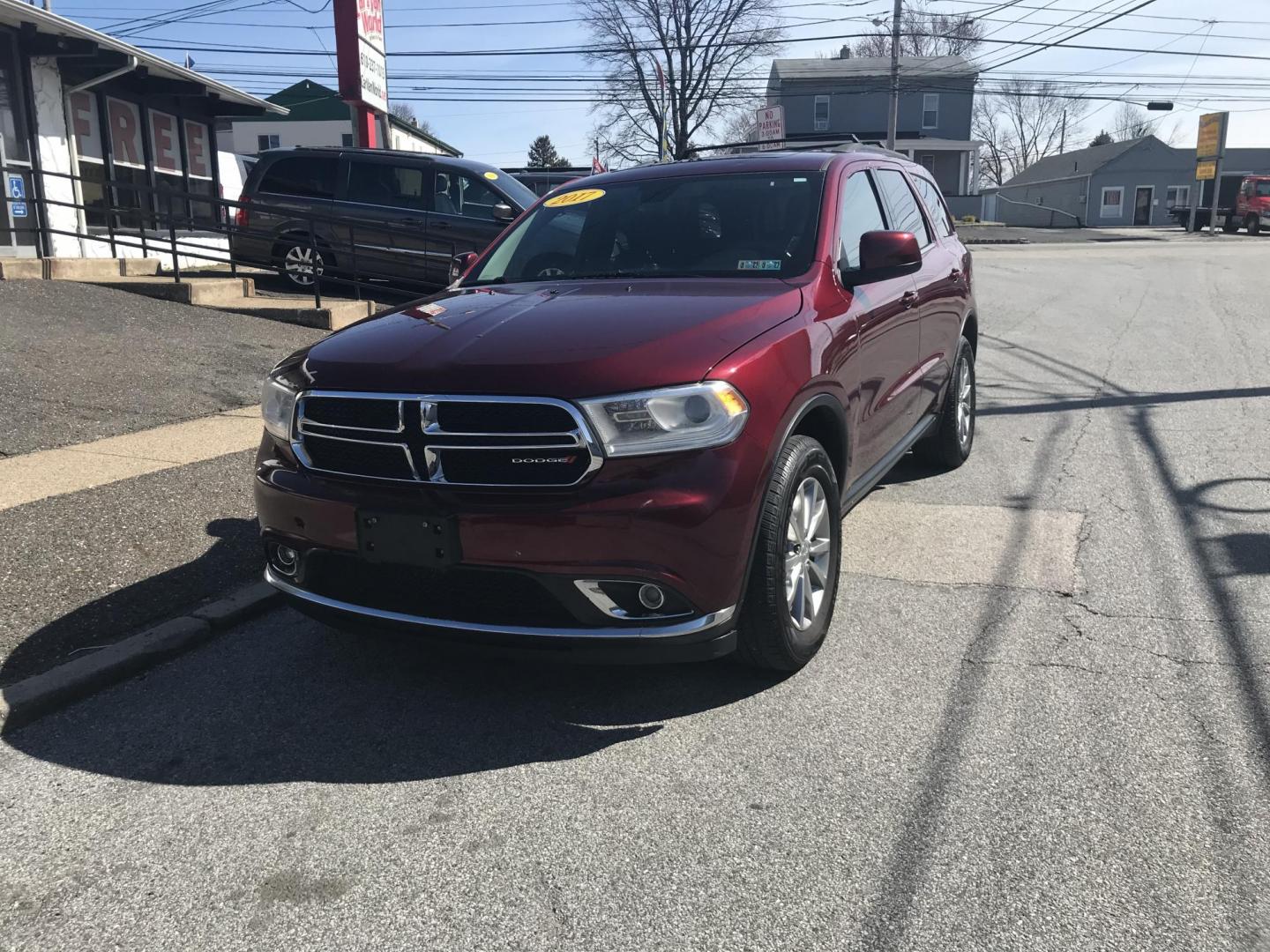 2017 Maroon /Gray Dodge Durango SXT AWD (1C4RDJAG1HC) with an 3.6L V6 DOHC 24V engine, 8A transmission, located at 577 Chester Pike, Prospect Park, PA, 19076, (610) 237-1015, 39.886154, -75.302338 - 2017 Dodge Durango SXT: AWD, 3rd row seating, sunroof, backup camera, new PA inspection, RUNS LIKE NEW! This vehicle comes inspected and has been given a bumper to bumper safety check. It is very clean, reliable, and well maintained. We offer a unique pay plan that is known for being the easiest - Photo#2