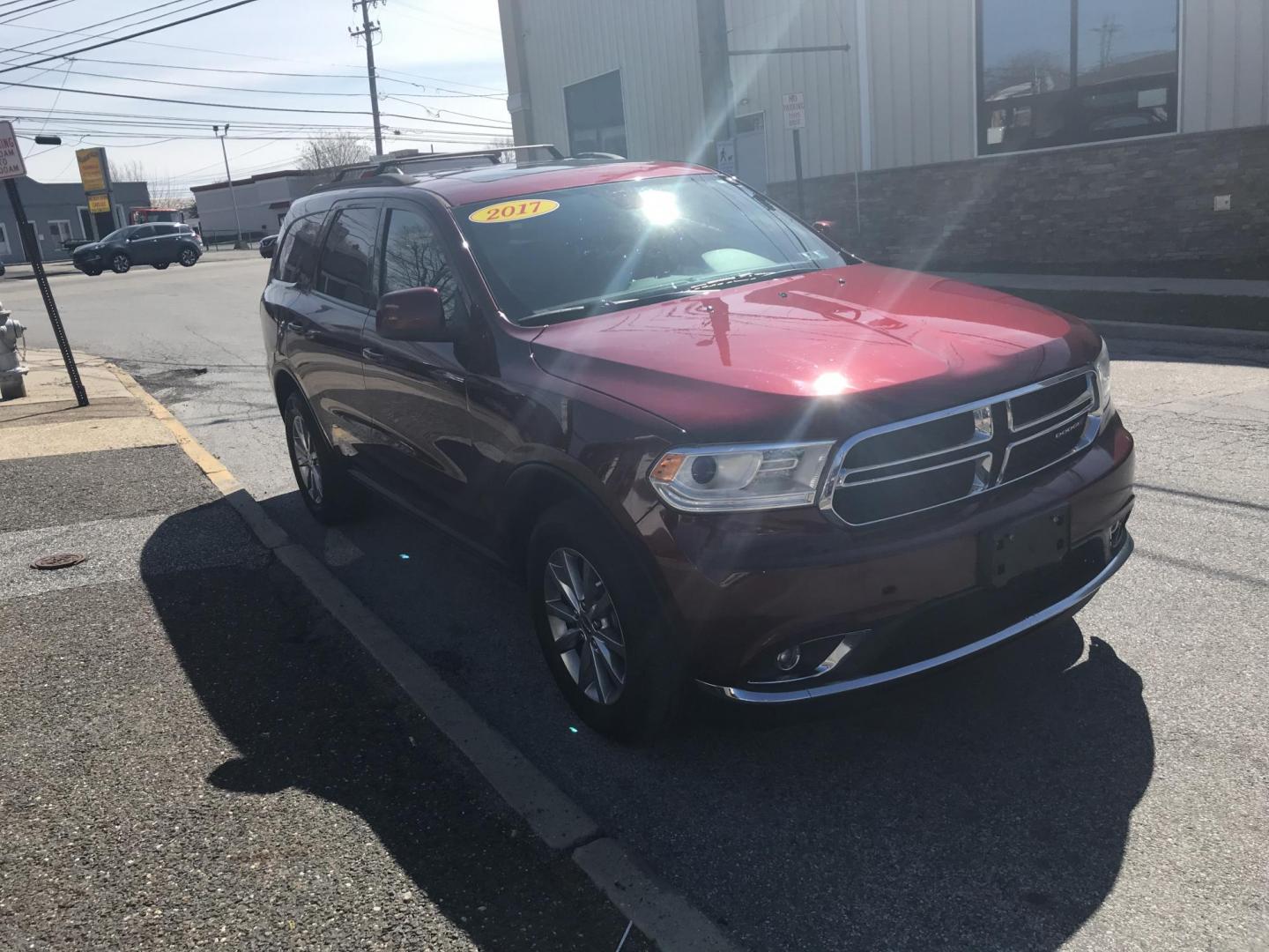 2017 Maroon /Gray Dodge Durango SXT AWD (1C4RDJAG1HC) with an 3.6L V6 DOHC 24V engine, 8A transmission, located at 577 Chester Pike, Prospect Park, PA, 19076, (610) 237-1015, 39.886154, -75.302338 - 2017 Dodge Durango SXT: AWD, 3rd row seating, sunroof, backup camera, new PA inspection, RUNS LIKE NEW! This vehicle comes inspected and has been given a bumper to bumper safety check. It is very clean, reliable, and well maintained. We offer a unique pay plan that is known for being the easiest - Photo#3