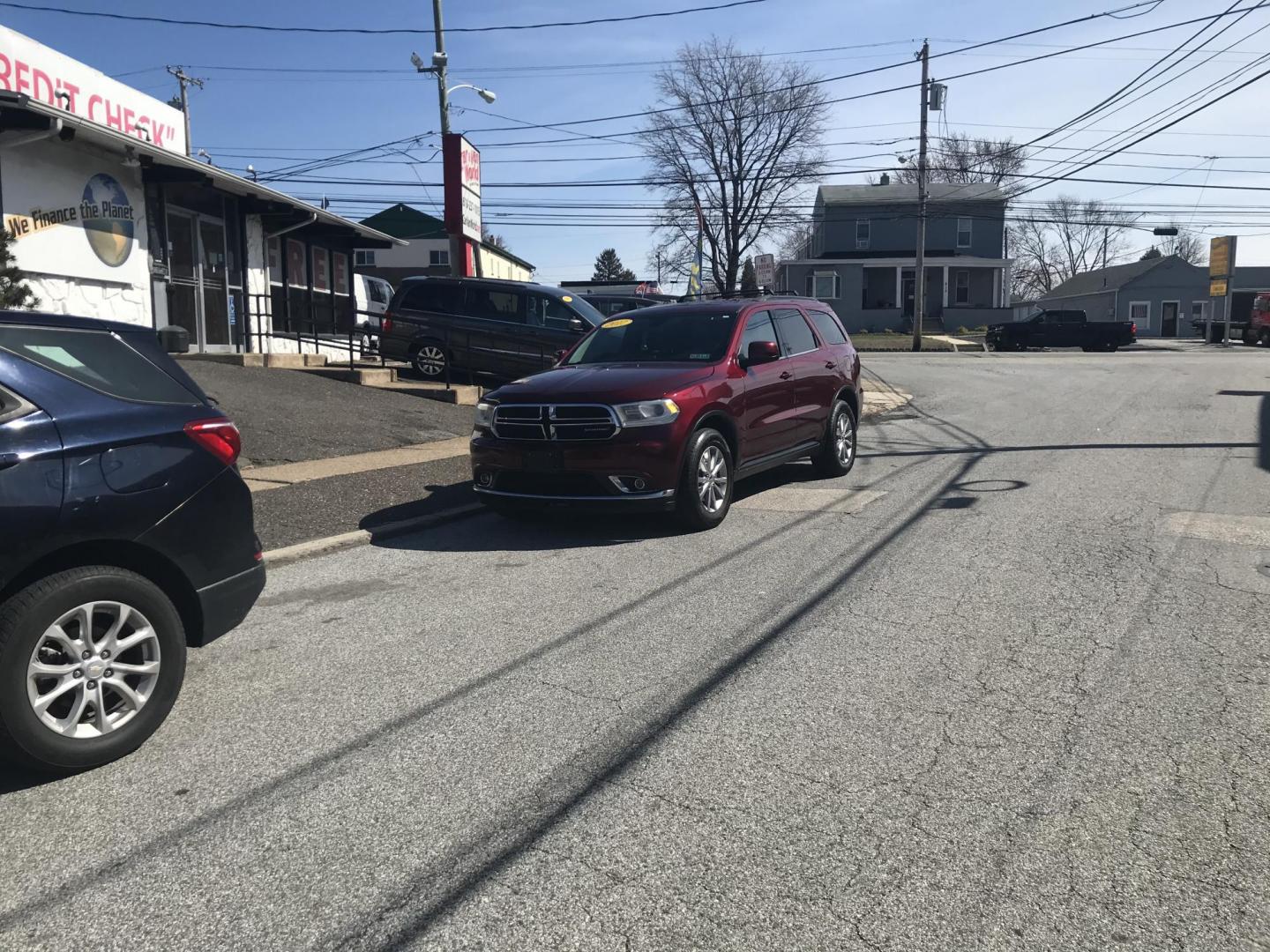 2017 Maroon /Gray Dodge Durango SXT AWD (1C4RDJAG1HC) with an 3.6L V6 DOHC 24V engine, 8A transmission, located at 577 Chester Pike, Prospect Park, PA, 19076, (610) 237-1015, 39.886154, -75.302338 - 2017 Dodge Durango SXT: AWD, 3rd row seating, sunroof, backup camera, new PA inspection, RUNS LIKE NEW! This vehicle comes inspected and has been given a bumper to bumper safety check. It is very clean, reliable, and well maintained. We offer a unique pay plan that is known for being the easiest - Photo#1