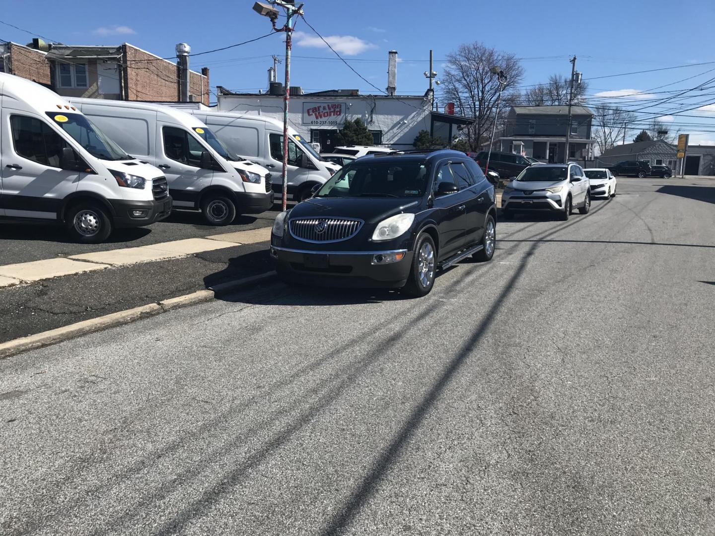 2012 Black /Black Buick Enclave Premium AWD (5GAKVDED4CJ) with an 3.6L V6 DOHC 24V engine, 6-Speed Automatic Overdrive transmission, located at 577 Chester Pike, Prospect Park, PA, 19076, (610) 237-1015, 39.886154, -75.302338 - Photo#1