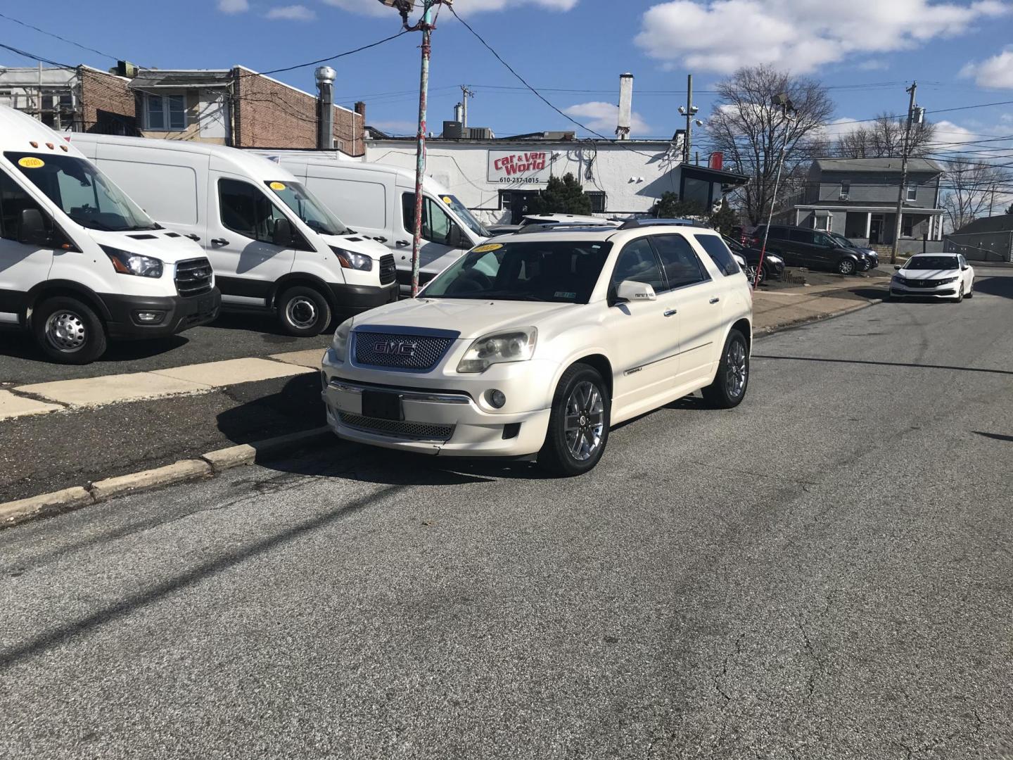 2012 White /Black GMC Acadia Denali AWD (1GKKVTED8CJ) with an 3.6L V6 DOHC 24V engine, 6-Speed Automatic transmission, located at 577 Chester Pike, Prospect Park, PA, 19076, (610) 237-1015, 39.886154, -75.302338 - 2012 GMC Acadia Denali: AWD, 3rd row seating, sunroofs, DVD player, navigation system, SUPER CLEAN, runs LIKE NEW! This vehicle comes inspected and has been given a bumper to bumper safety check. It is very clean, reliable, and well maintained. We offer a unique pay plan that is known for being t - Photo#1