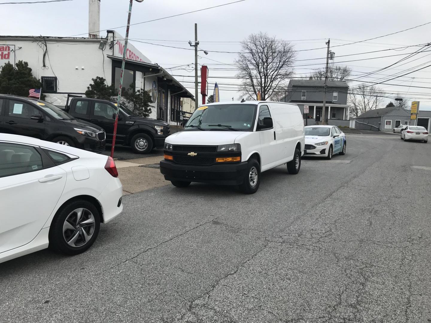 2020 White /Gray Chevrolet Express 2500 Cargo (1GCWGAFG0L1) with an 6.0L V8 OHV 16V FFV engine, 6A transmission, located at 577 Chester Pike, Prospect Park, PA, 19076, (610) 237-1015, 39.886154, -75.302338 - 2020 Chevrolet Express 2500: Backup camera, new PA inspection, SUPER CLEAN, FLEET MAINTAINED! This vehicle comes inspected and has been given a bumper to bumper safety check. It is very clean, reliable, and well maintained. We offer a unique pay plan that is known for being the easiest and fastes - Photo#1