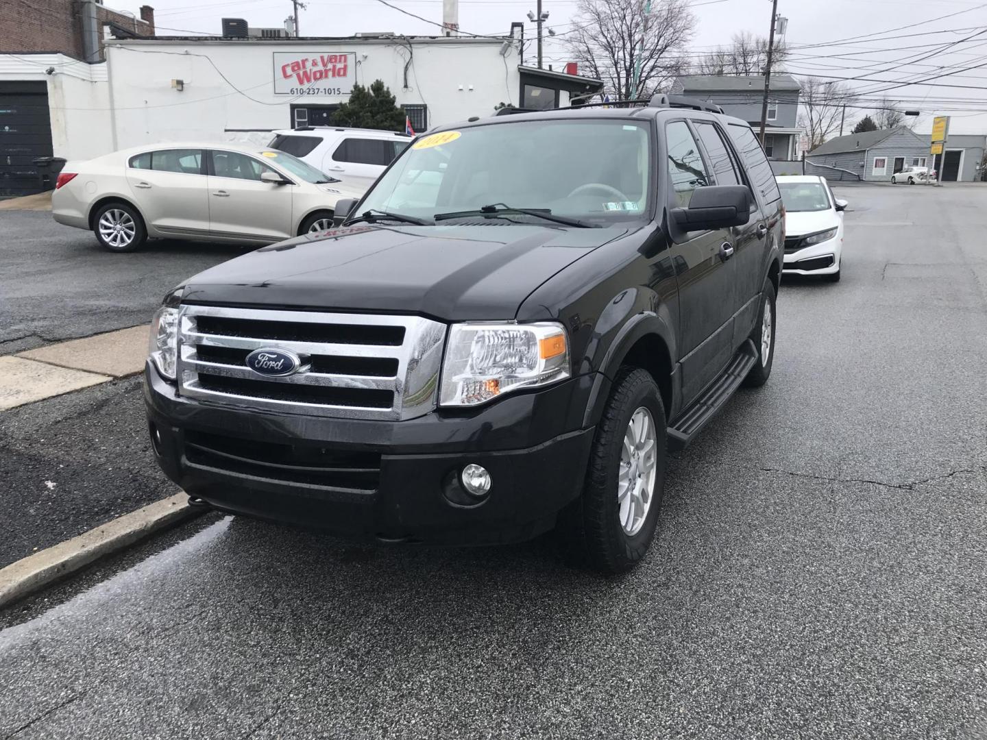 2014 Black /Beige Ford Expedition XLT 4WD (1FMJU1J53EE) with an 5.4L V8 SOHC 16V FFV engine, 6-Speed Automatic transmission, located at 577 Chester Pike, Prospect Park, PA, 19076, (610) 237-1015, 39.886154, -75.302338 - 2014 Ford Expedition XLT: 3rd row seating, 4x4, sunroof, new PA inspection, SUPER CLEAN, runs LIKE NEW! This vehicle comes inspected and has been given a bumper to bumper safety check. It is very clean, reliable, and well maintained. We offer a unique pay plan that is known for being the easiest - Photo#2