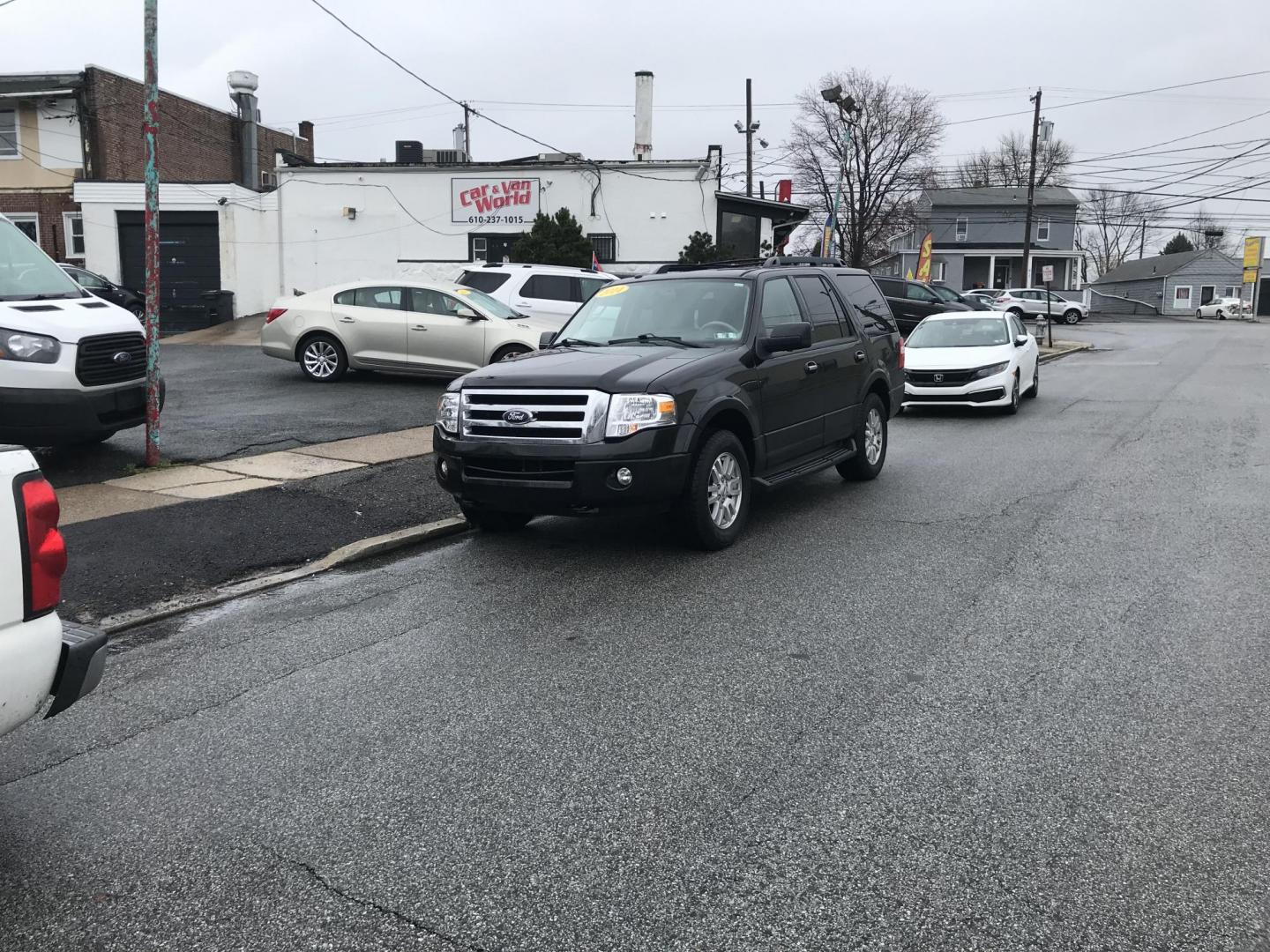 2014 Black /Beige Ford Expedition XLT 4WD (1FMJU1J53EE) with an 5.4L V8 SOHC 16V FFV engine, 6-Speed Automatic transmission, located at 577 Chester Pike, Prospect Park, PA, 19076, (610) 237-1015, 39.886154, -75.302338 - 2014 Ford Expedition XLT: 3rd row seating, 4x4, sunroof, new PA inspection, SUPER CLEAN, runs LIKE NEW! This vehicle comes inspected and has been given a bumper to bumper safety check. It is very clean, reliable, and well maintained. We offer a unique pay plan that is known for being the easiest - Photo#1