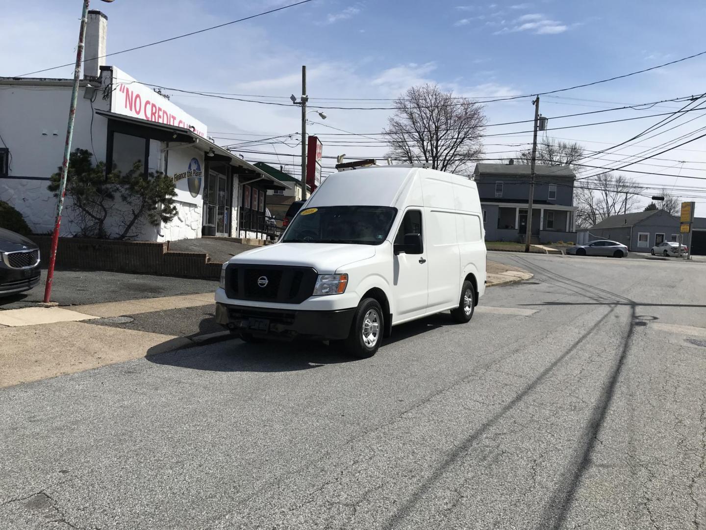 2016 White /Gray Nissan NV Cargo 2500 HD S V6 High Roof (1N6BF0LY5GN) with an 4.0L V6 engine, 5A transmission, located at 577 Chester Pike, Prospect Park, PA, 19076, (610) 237-1015, 39.886154, -75.302338 - 2016 Nissan NV 2500 High Roof: Only 123k miles, ladder racks, shelving, partition, new PA inspection, FLEET MAINTAINED! This vehicle comes inspected and has been given a bumper to bumper safety check. It is very clean, reliable, and well maintained. We offer a unique pay plan that is known for be - Photo#1