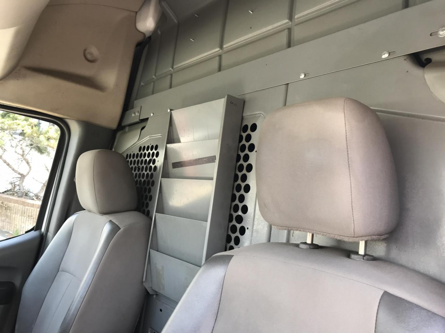 2016 White /Gray Nissan NV Cargo 2500 HD S V6 High Roof (1N6BF0LY5GN) with an 4.0L V6 engine, 5A transmission, located at 577 Chester Pike, Prospect Park, PA, 19076, (610) 237-1015, 39.886154, -75.302338 - 2016 Nissan NV 2500 High Roof: Only 123k miles, ladder racks, shelving, partition, new PA inspection, FLEET MAINTAINED! This vehicle comes inspected and has been given a bumper to bumper safety check. It is very clean, reliable, and well maintained. We offer a unique pay plan that is known for be - Photo#10