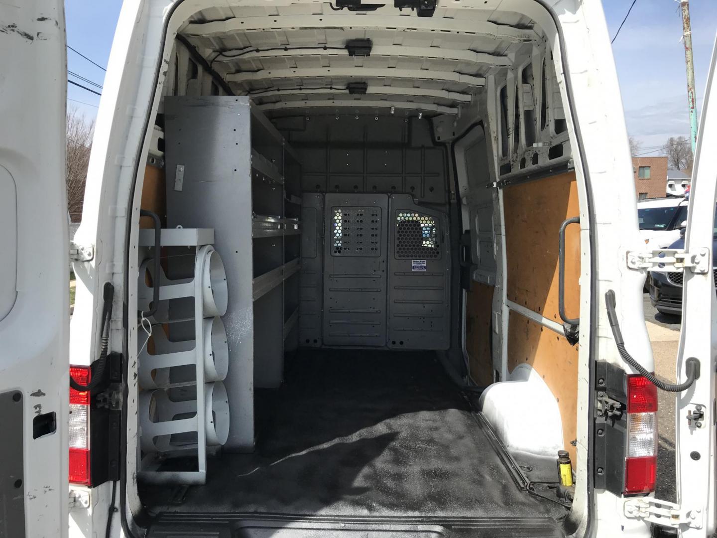 2016 White /Gray Nissan NV Cargo 2500 HD S V6 High Roof (1N6BF0LY5GN) with an 4.0L V6 engine, 5A transmission, located at 577 Chester Pike, Prospect Park, PA, 19076, (610) 237-1015, 39.886154, -75.302338 - 2016 Nissan NV 2500 High Roof: Only 123k miles, ladder racks, shelving, partition, new PA inspection, FLEET MAINTAINED! This vehicle comes inspected and has been given a bumper to bumper safety check. It is very clean, reliable, and well maintained. We offer a unique pay plan that is known for be - Photo#15