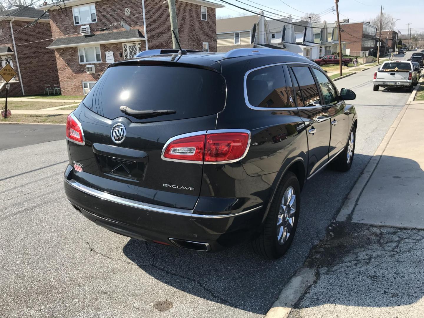 2014 Black /Black Buick Enclave Leather (5GAKRBKDXEJ) with an 3.6L V6 DOHC 24V engine, 6-Speed Automatic Overdrive transmission, located at 577 Chester Pike, Prospect Park, PA, 19076, (610) 237-1015, 39.886154, -75.302338 - 2014 Buick Enclave: Dual sunroofs, 3rd row seating, backup camera, new PA inspection, runs LIKE NEW! This vehicle comes inspected and has been given a bumper to bumper safety check. It is very clean, reliable, and well maintained. We offer a unique pay plan that is known for being the easiest and - Photo#4