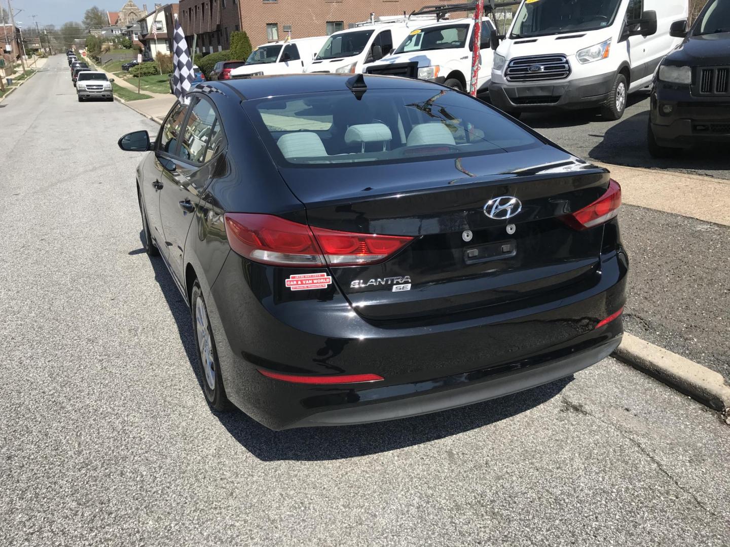 2017 Black /Gray Hyundai Elantra SE 6AT (KMHD74LF6HU) with an 1.8L L4 DOHC 16V engine, 6A transmission, located at 577 Chester Pike, Prospect Park, PA, 19076, (610) 237-1015, 39.886154, -75.302338 - 2017 Hyundai Elantra: Only 95k miles, great on gas, new PA inspection, SUPER CLEAN, runs LIKE NEW! This vehicle comes inspected and has been given a bumper to bumper safety check. It is very clean, reliable, and well maintained. We offer a unique pay plan that is known for being the easiest and f - Photo#5