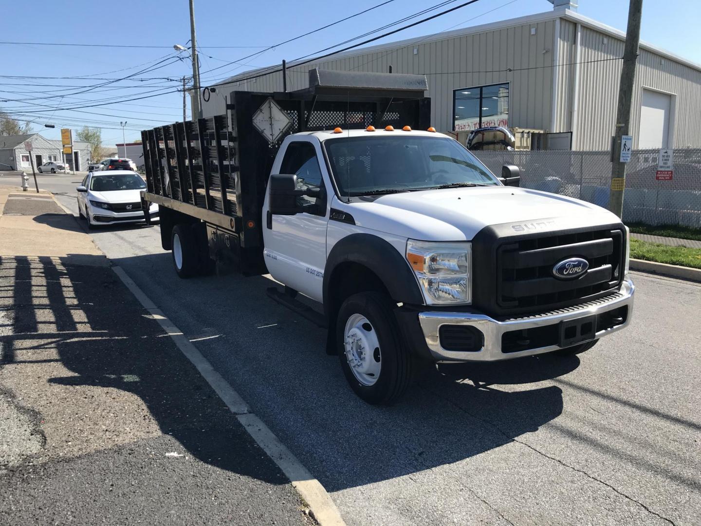 2011 White /Gray Ford F-450 SD Regular Cab DRW 2WD (1FDUF4GY7BE) with an 6.8L V10 SOHC 30V engine, Automatic transmission, located at 577 Chester Pike, Prospect Park, PA, 19076, (610) 237-1015, 39.886154, -75.302338 - 2011 Ford F450: Stake body bed, 8 feet wide 17 feet long cargo area, dually, power lift gate, SUPER CLEAN, runs LIKE NEW! - Photo#1