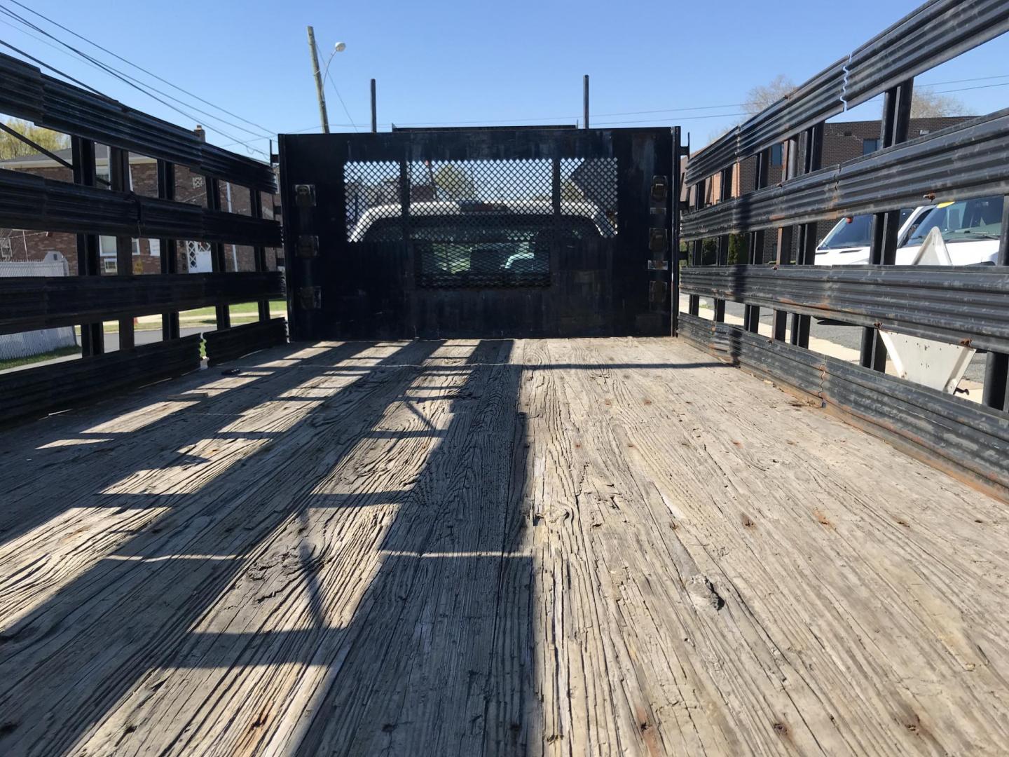 2011 White /Gray Ford F-450 SD Regular Cab DRW 2WD (1FDUF4GY7BE) with an 6.8L V10 SOHC 30V engine, Automatic transmission, located at 577 Chester Pike, Prospect Park, PA, 19076, (610) 237-1015, 39.886154, -75.302338 - 2011 Ford F450: Stake body bed, 8 feet wide 17 feet long cargo area, dually, power lift gate, SUPER CLEAN, runs LIKE NEW! - Photo#11