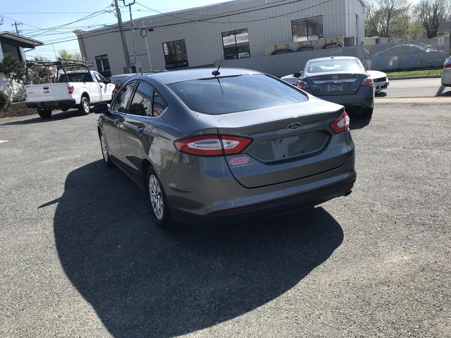 2014 Gray /Black Ford Fusion S (1FA6P0G78E5) with an 2.5L L4 DOHC 16V engine, Automatic transmission, located at 577 Chester Pike, Prospect Park, PA, 19076, (610) 237-1015, 39.886154, -75.302338 - 2014 Ford Fusion S: New PA inspection, great on gas, SUPER CLEAN, runs LIKE NEW! This vehicle comes inspected and has been given a bumper to bumper safety check. It is very clean, reliable, and well maintained. We offer a unique pay plan that is known for being the easiest and fastest financing o - Photo#5