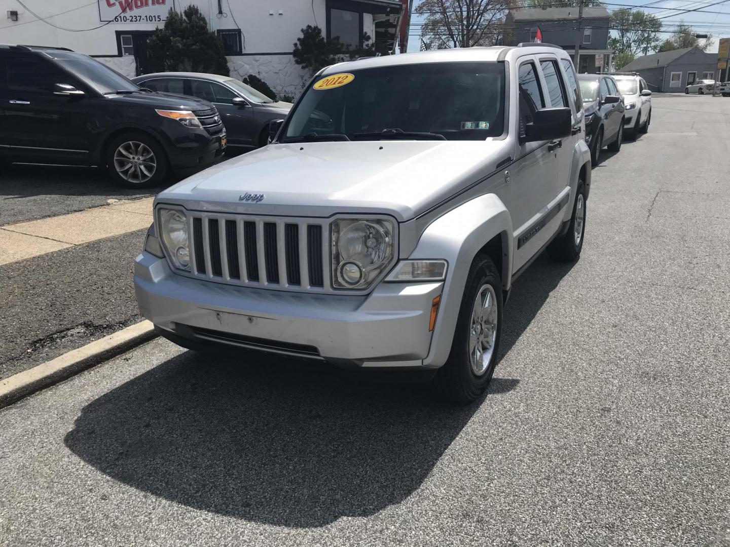 2012 Silver /Gray Jeep Liberty Sport 4WD (1C4PJMAKXCW) with an 3.7L V6 SOHC 12V engine, 4-Speed Automatic transmission, located at 577 Chester Pike, Prospect Park, PA, 19076, (610) 237-1015, 39.886154, -75.302338 - 2012 Jeep Liberty: Only 134k miles, 4x4, screen radio, new PA inspection, SUPER CLEAN, runs LIKE NEW! This vehicle comes inspected and has been given a bumper to bumper safety check. It is very clean, reliable, and well maintained. We offer a unique pay plan that is known for being the easiest an - Photo#2