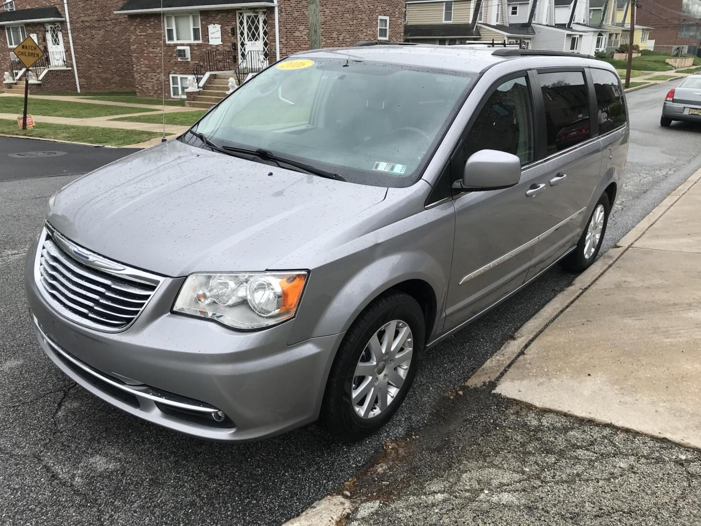 2016 Silver /Tan Chrysler Town & Country Touring (2C4RC1BG1GR) with an 3.6L V6 DOHC 24V engine, 6A transmission, located at 577 Chester Pike, Prospect Park, PA, 19076, (610) 237-1015, 39.886154, -75.302338 - 2016 Chrysler Town & Country Touring: DVD player, backup camera, stow and go seating, new PA inspection, SUPER CLEAN, runs LIKE NEW! This vehicle comes inspected and has been given a bumper to bumper safety check. It is very clean, reliable, and well maintained. We offer a unique pay plan that is - Photo#3