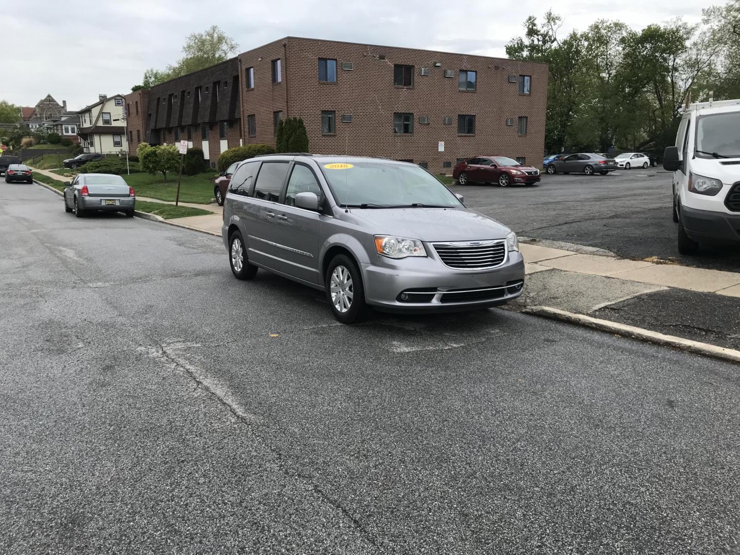 2016 Silver /Tan Chrysler Town & Country Touring (2C4RC1BG1GR) with an 3.6L V6 DOHC 24V engine, 6A transmission, located at 577 Chester Pike, Prospect Park, PA, 19076, (610) 237-1015, 39.886154, -75.302338 - 2016 Chrysler Town & Country Touring: DVD player, backup camera, stow and go seating, new PA inspection, SUPER CLEAN, runs LIKE NEW! This vehicle comes inspected and has been given a bumper to bumper safety check. It is very clean, reliable, and well maintained. We offer a unique pay plan that is - Photo#1