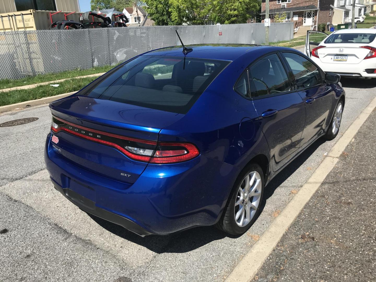 2013 Blue /Black Dodge Dart SXT (1C3CDFBA4DD) with an 2.0L L4 DOHC 16V TURBO engine, Automatic transmission, located at 577 Chester Pike, Prospect Park, PA, 19076, (610) 237-1015, 39.886154, -75.302338 - 2013 Dodge Dart SXT: Only 110k miles, sunroof, backup camera, new PA inspection, SUPER CLEAN, runs LIKE NEW! This vehicle comes inspected and has been given a bumper to bumper safety check. It is very clean, reliable, and well maintained. We offer a unique pay plan that is known for being the eas - Photo#4