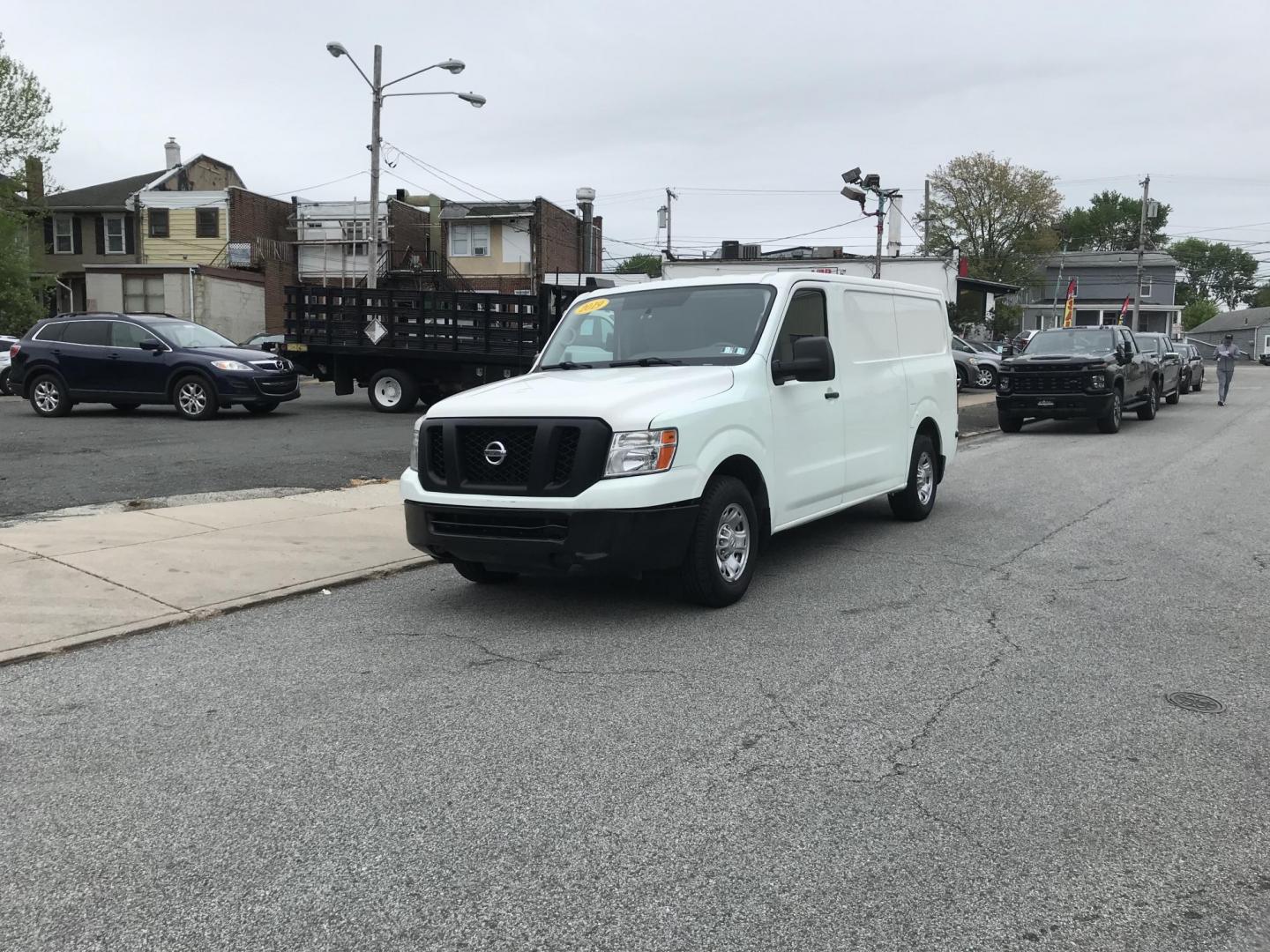 2019 White /Gray Nissan NV Cargo 1500 SV (1N6BF0KM6KN) with an 4.0L V6 engine, 5A transmission, located at 577 Chester Pike, Prospect Park, PA, 19076, (610) 237-1015, 39.886154, -75.302338 - 2019 Nissan NV 1500: Fleet maintained cargo van, shelving, backup camera, partition, no side or rear windows, runs LIKE NEW! This vehicle comes inspected and has been given a bumper to bumper safety check. It is very clean, reliable, and well maintained. We offer a unique pay plan that is known f - Photo#1