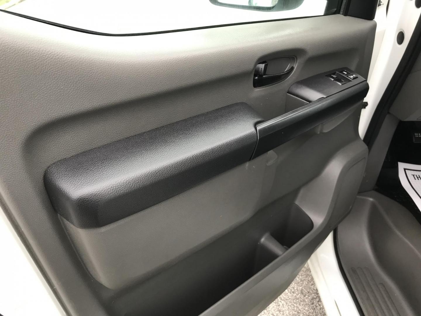 2019 White /Gray Nissan NV Cargo 1500 SV (1N6BF0KM6KN) with an 4.0L V6 engine, 5A transmission, located at 577 Chester Pike, Prospect Park, PA, 19076, (610) 237-1015, 39.886154, -75.302338 - 2019 Nissan NV 1500: Fleet maintained cargo van, shelving, backup camera, partition, no side or rear windows, runs LIKE NEW! This vehicle comes inspected and has been given a bumper to bumper safety check. It is very clean, reliable, and well maintained. We offer a unique pay plan that is known f - Photo#7