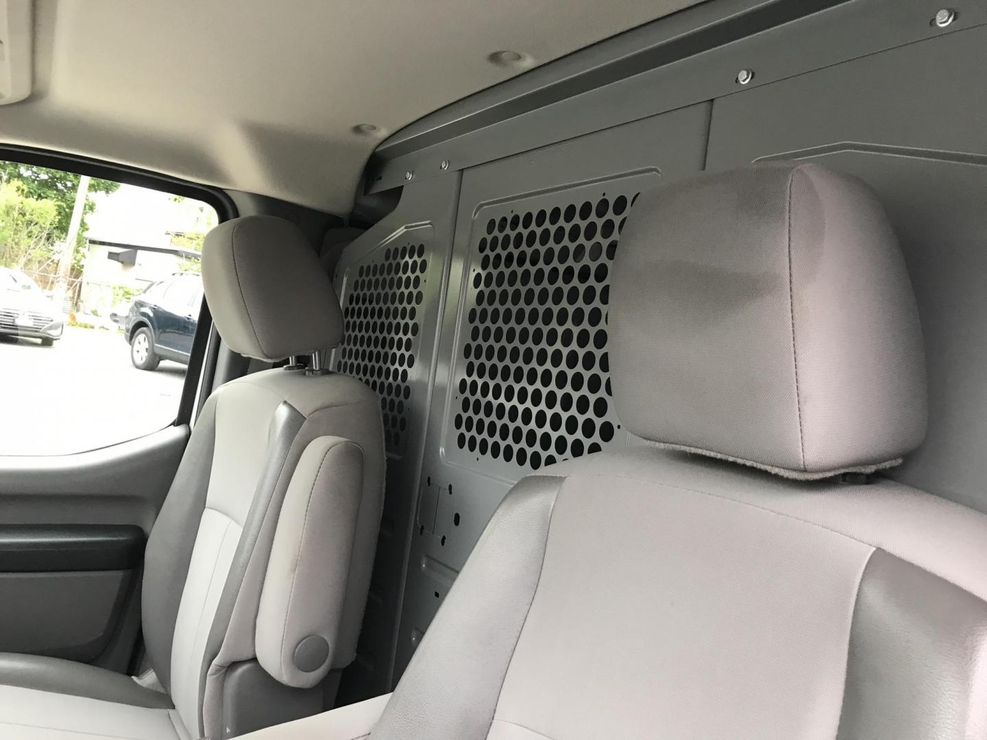 2019 White /Gray Nissan NV Cargo 1500 SV (1N6BF0KM6KN) with an 4.0L V6 engine, 5A transmission, located at 577 Chester Pike, Prospect Park, PA, 19076, (610) 237-1015, 39.886154, -75.302338 - 2019 Nissan NV 1500: Fleet maintained cargo van, shelving, backup camera, partition, no side or rear windows, runs LIKE NEW! This vehicle comes inspected and has been given a bumper to bumper safety check. It is very clean, reliable, and well maintained. We offer a unique pay plan that is known f - Photo#9