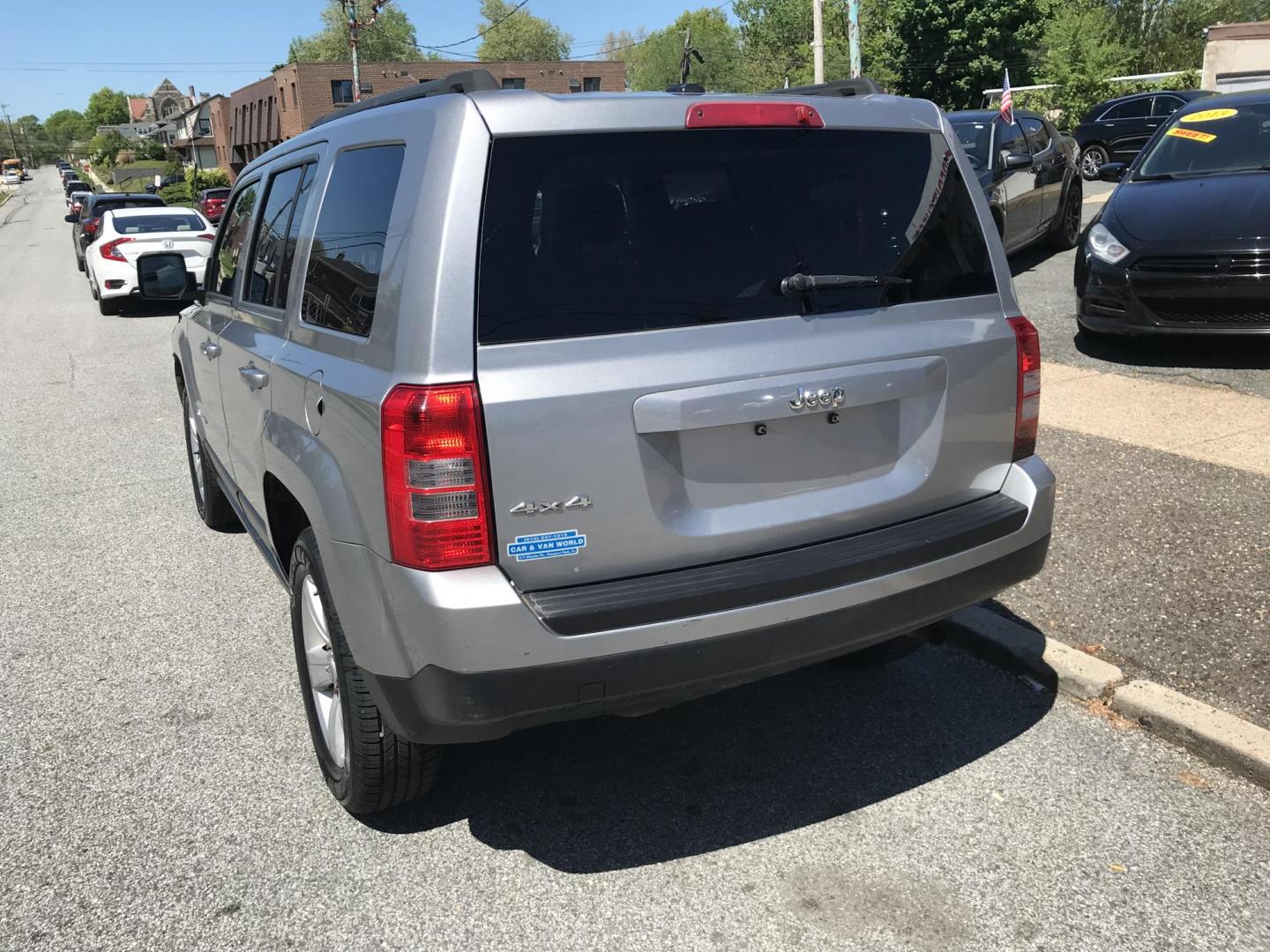 2014 Silver /Beige Jeep Patriot Sport 4WD (1C4NJRBBXED) with an 2.4L L4 DOHC 16V engine, Automatic transmission, located at 577 Chester Pike, Prospect Park, PA, 19076, (610) 237-1015, 39.886154, -75.302338 - 2014 Jeep Patriot: New PA inspection, great on gas, SUPER CLEAN, runs LIKE NEW! This vehicle comes inspected and has been given a bumper to bumper safety check. It is very clean, reliable, and well maintained. We offer a unique pay plan that is known for being the easiest and fastest financing op - Photo#5