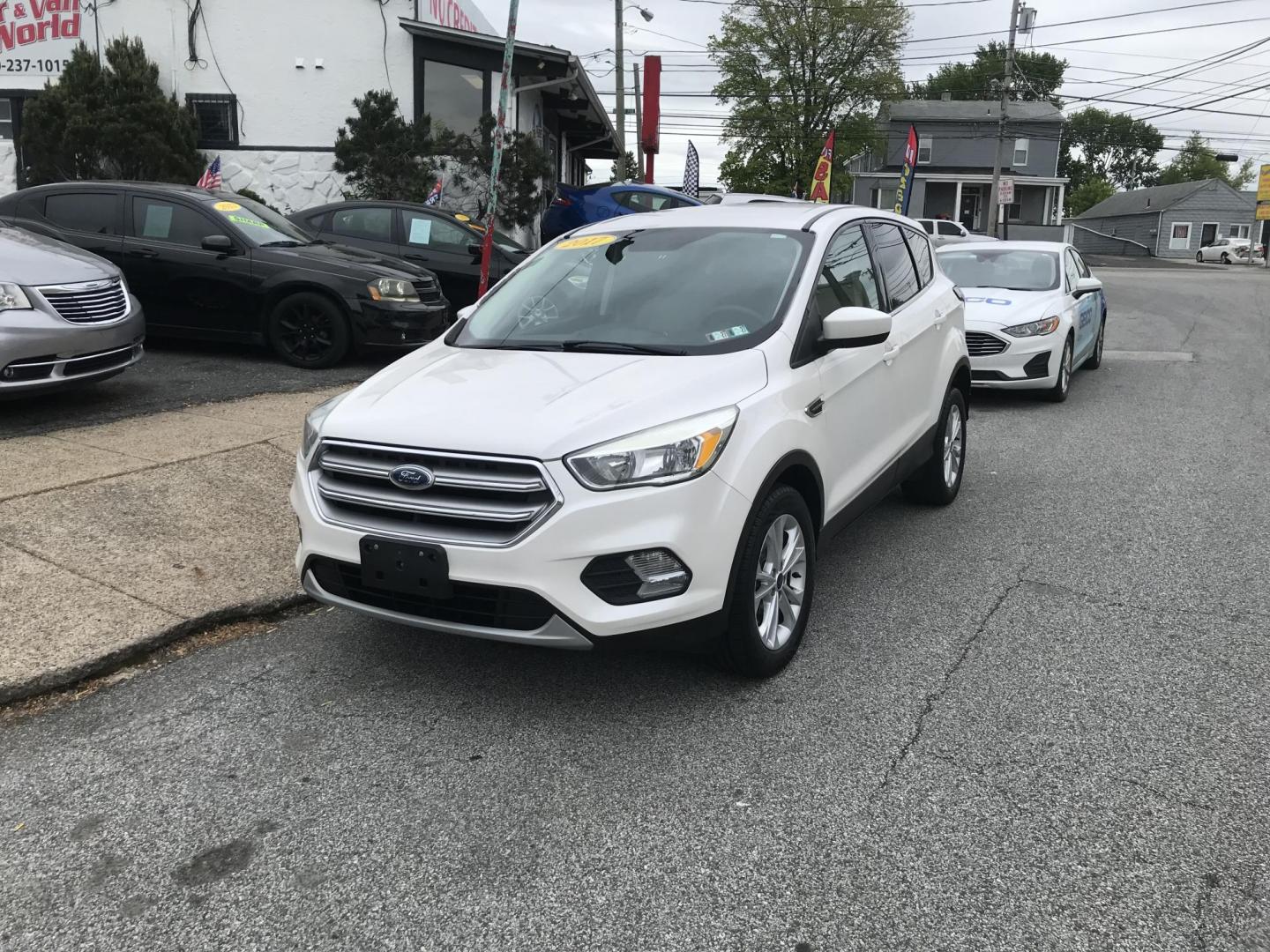 2017 White /Gray Ford Escape SE 4WD (1FMCU9GD6HU) with an 1.5L L4 DOHC 16V engine, 6A transmission, located at 577 Chester Pike, Prospect Park, PA, 19076, (610) 237-1015, 39.886154, -75.302338 - 2017 Ford Escape SE: 4x4, backup camera, new PA inspection, great on gas, SUPER CLEAN, runs LIKE NEW! This vehicle comes inspected and has been given a bumper to bumper safety check. It is very clean, reliable, and well maintained. We offer a unique pay plan that is known for being the easiest an - Photo#2