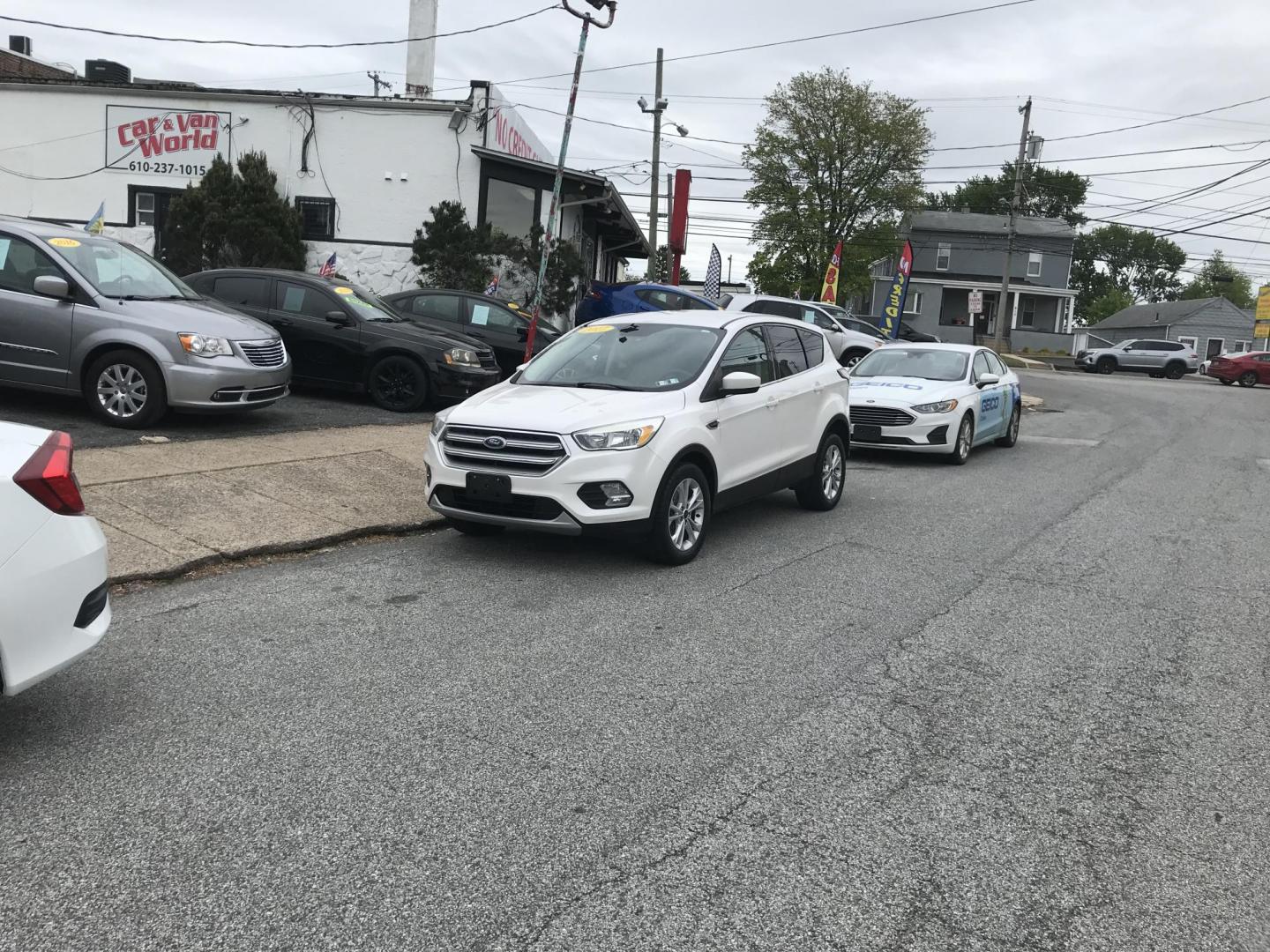 2017 White /Gray Ford Escape SE 4WD (1FMCU9GD6HU) with an 1.5L L4 DOHC 16V engine, 6A transmission, located at 577 Chester Pike, Prospect Park, PA, 19076, (610) 237-1015, 39.886154, -75.302338 - 2017 Ford Escape SE: 4x4, backup camera, new PA inspection, great on gas, SUPER CLEAN, runs LIKE NEW! This vehicle comes inspected and has been given a bumper to bumper safety check. It is very clean, reliable, and well maintained. We offer a unique pay plan that is known for being the easiest an - Photo#1