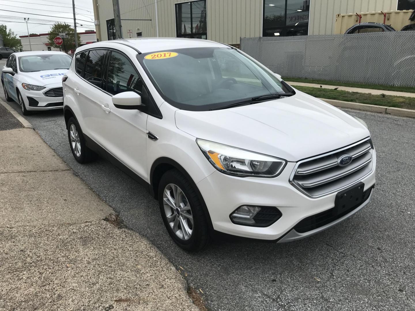 2017 White /Gray Ford Escape SE 4WD (1FMCU9GD6HU) with an 1.5L L4 DOHC 16V engine, 6A transmission, located at 577 Chester Pike, Prospect Park, PA, 19076, (610) 237-1015, 39.886154, -75.302338 - 2017 Ford Escape SE: 4x4, backup camera, new PA inspection, great on gas, SUPER CLEAN, runs LIKE NEW! This vehicle comes inspected and has been given a bumper to bumper safety check. It is very clean, reliable, and well maintained. We offer a unique pay plan that is known for being the easiest an - Photo#3