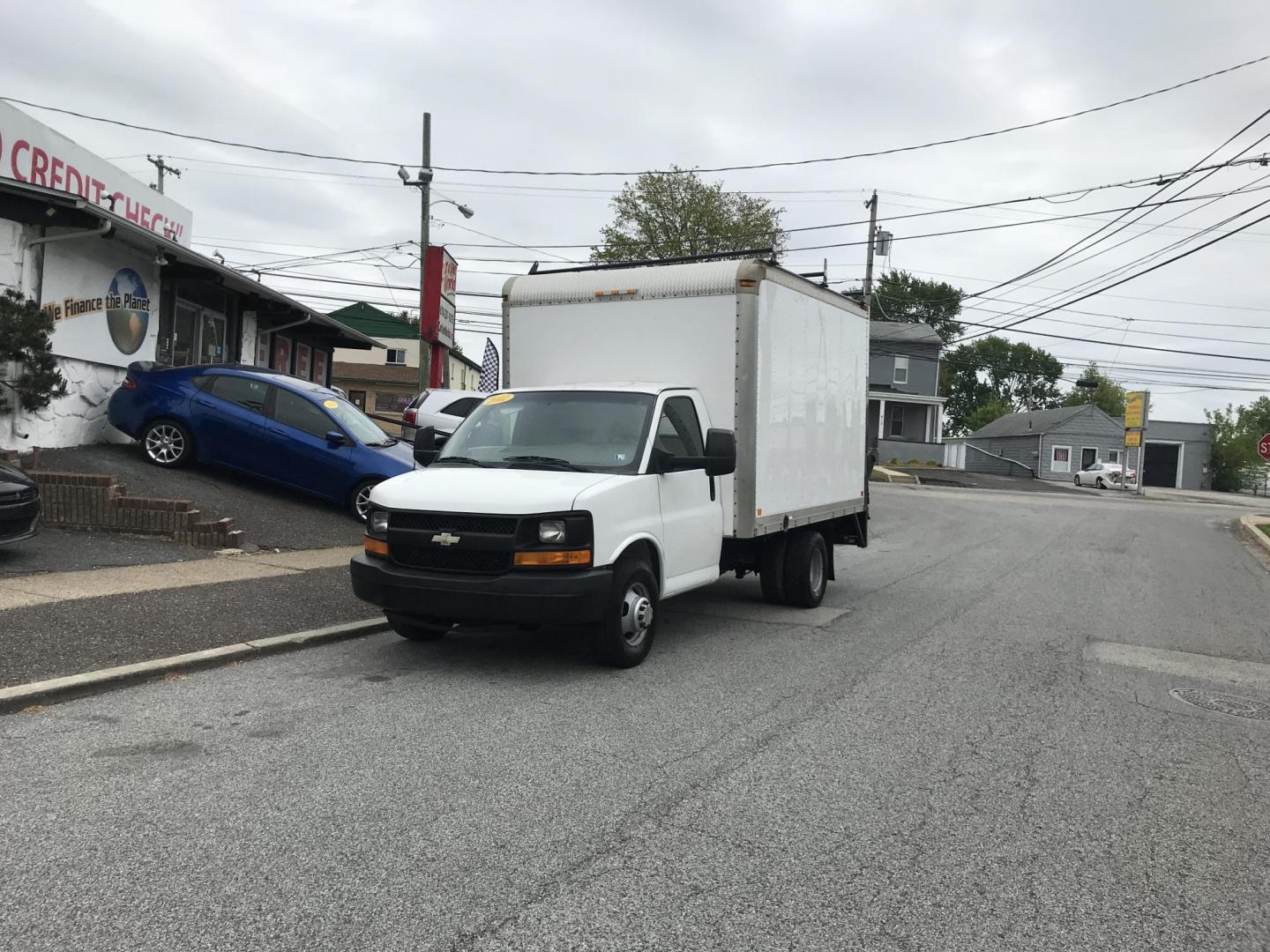 2012 White /Gray Chevrolet Express G3500 (1GB3G2CG2C1) with an 6.0L V8 OHV 16V FFV engine, 6-Speed Automatic transmission, located at 577 Chester Pike, Prospect Park, PA, 19076, (610) 237-1015, 39.886154, -75.302338 - 2012 Chevrolet Express 3500: Only 93k miles, power lift gate, backup camera, runs EXCELLENT! **Dimensions: 11 1/2 ft long, 7 1/2 ft wide, 7ft 3 inch tall** This vehicle comes inspected and has been given a bumper to bumper safety check. It is very clean, reliable, and well maintained. We offer a - Photo#1