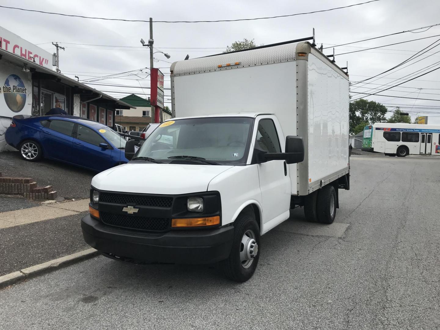 2012 White /Gray Chevrolet Express G3500 (1GB3G2CG2C1) with an 6.0L V8 OHV 16V FFV engine, 6-Speed Automatic transmission, located at 577 Chester Pike, Prospect Park, PA, 19076, (610) 237-1015, 39.886154, -75.302338 - 2012 Chevrolet Express 3500: Only 93k miles, power lift gate, backup camera, runs EXCELLENT! **Dimensions: 11 1/2 ft long, 7 1/2 ft wide, 7ft 3 inch tall** This vehicle comes inspected and has been given a bumper to bumper safety check. It is very clean, reliable, and well maintained. We offer a - Photo#2