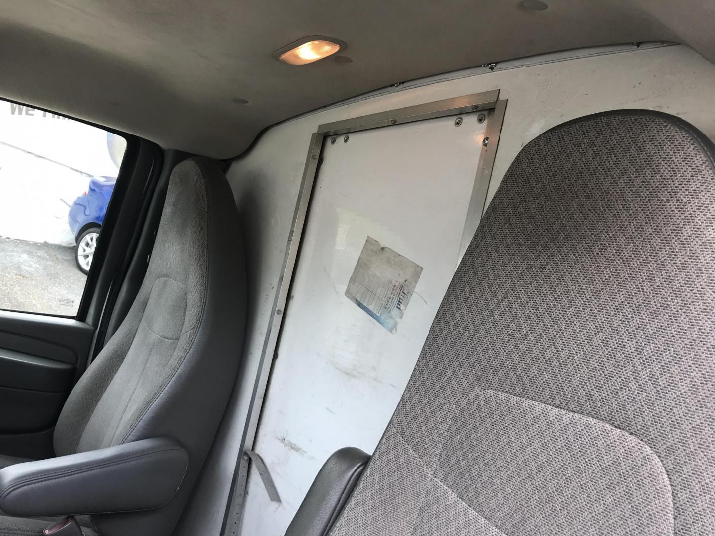 2012 White /Gray Chevrolet Express G3500 (1GB3G2CG2C1) with an 6.0L V8 OHV 16V FFV engine, 6-Speed Automatic transmission, located at 577 Chester Pike, Prospect Park, PA, 19076, (610) 237-1015, 39.886154, -75.302338 - 2012 Chevrolet Express 3500: Only 93k miles, power lift gate, backup camera, runs EXCELLENT! **Dimensions: 11 1/2 ft long, 7 1/2 ft wide, 7ft 3 inch tall** This vehicle comes inspected and has been given a bumper to bumper safety check. It is very clean, reliable, and well maintained. We offer a - Photo#7