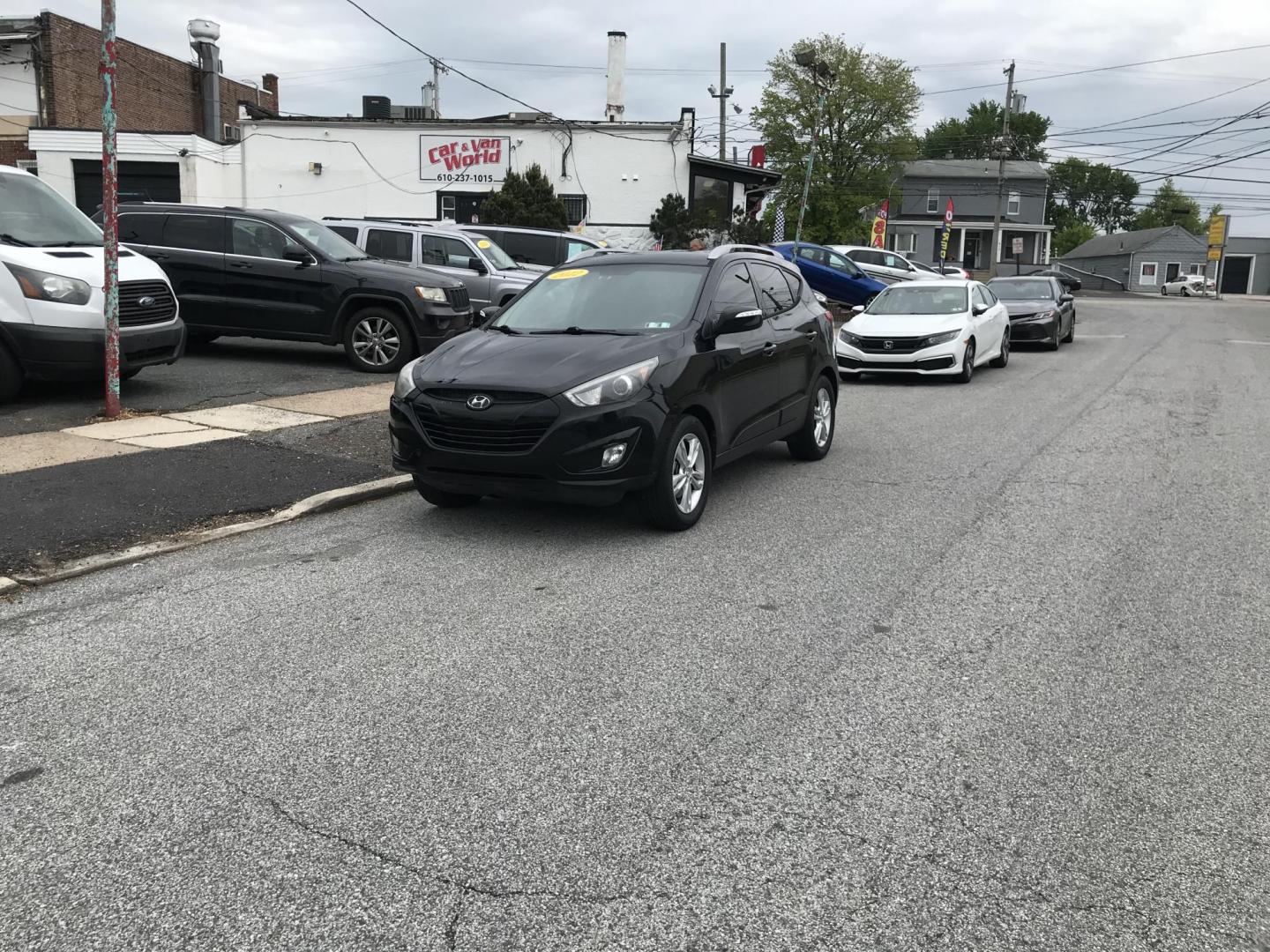 2012 Black /Gray Hyundai Tucson Limited (KM8JU3AC3CU) with an 2.4L L4 DOHC 16V engine, 6-Speed Automatic transmission, located at 577 Chester Pike, Prospect Park, PA, 19076, (610) 237-1015, 39.886154, -75.302338 - 2012 Hyundai Tucson LIMITED: Only 111k miles, new PA inspection, great on gas, SUPER CLEAN, runs LIKE NEW! This vehicle comes inspected and has been given a bumper to bumper safety check. It is very clean, reliable, and well maintained. We offer a unique pay plan that is known for being the easie - Photo#14
