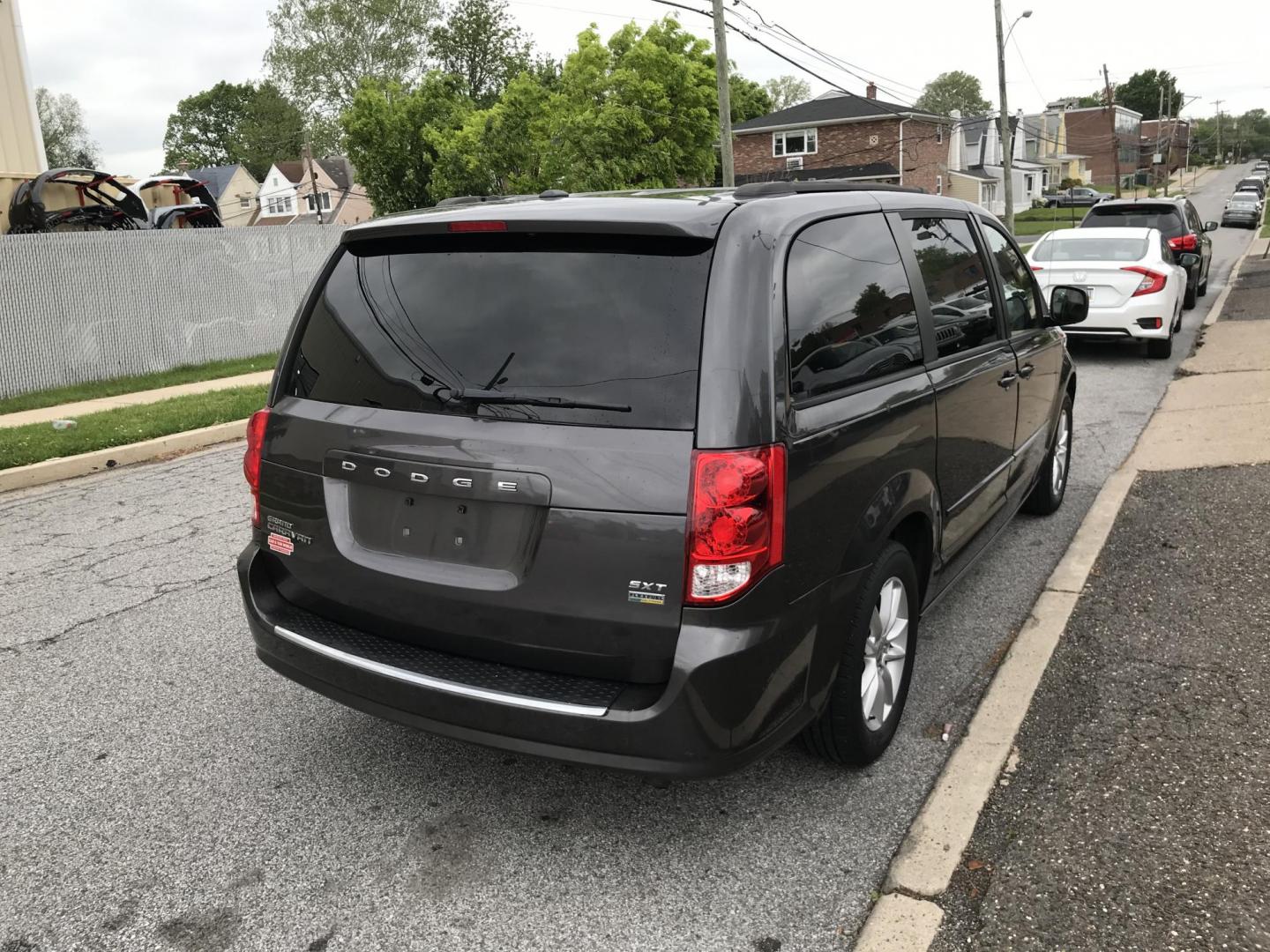2016 Gray /Gray Dodge Grand Caravan SXT (2C4RDGCG4GR) with an 3.6L V6 DOHC 24V engine, 6A transmission, located at 577 Chester Pike, Prospect Park, PA, 19076, (610) 237-1015, 39.886154, -75.302338 - 2016 Dodge Grand Caravan SXT: Only 102k miles, stow and go seating, great for families, SUPER CLEAN, runs LIKE NEW! This vehicle comes inspected and has been given a bumper to bumper safety check. It is very clean, reliable, and well maintained. We offer a unique pay plan that is known for being - Photo#4