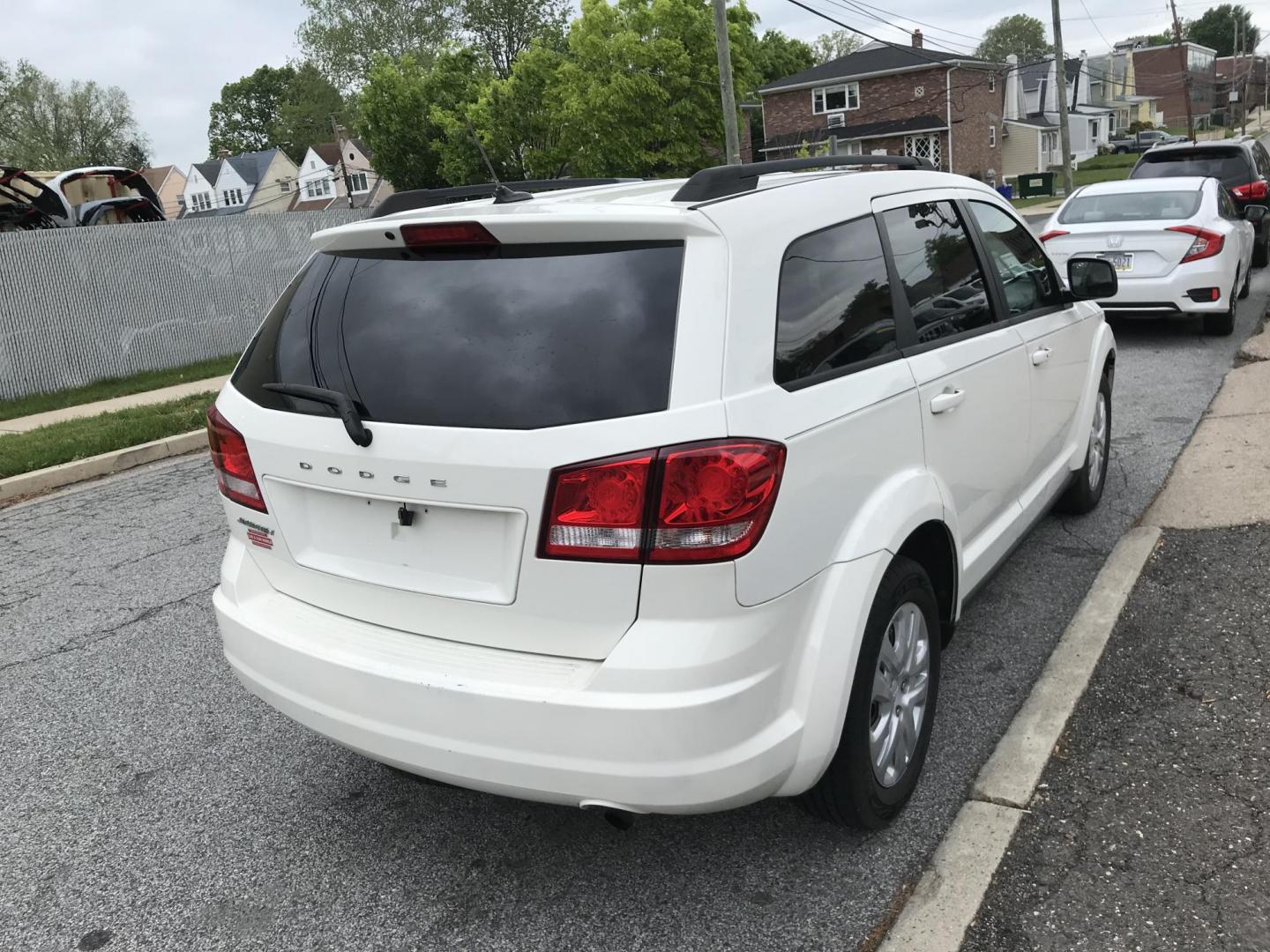 2013 White /Gray Dodge Journey SE (3C4PDCAB5DT) with an 2.4L L4 DOHC 16V engine, 4-Speed Automatic transmission, located at 577 Chester Pike, Prospect Park, PA, 19076, (610) 237-1015, 39.886154, -75.302338 - 2013 Dodge Journey: Only 114k miles, 3rd row seating, new PA inspection, RUNS LIKE NEW! This vehicle comes inspected and has been given a bumper to bumper safety check. It is very clean, reliable, and well maintained. We offer a unique pay plan that is known for being the easiest and fastest fina - Photo#4