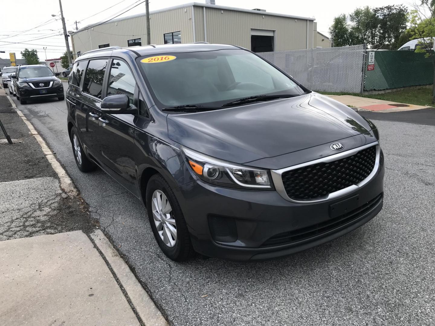 2016 Gray /Gray Kia Sedona LX (KNDMB5C16G6) with an 3.3L V6 DOHC 24V engine, 6-Speed Automatic transmission, located at 577 Chester Pike, Prospect Park, PA, 19076, (610) 237-1015, 39.886154, -75.302338 - 2016 Kia Sedona: Only 111k miles, backup camera, new PA inspection, SUPER CLEAN, runs LIKE NEW! This vehicle comes inspected and has been given a bumper to bumper safety check. It is very clean, reliable, and well maintained. We offer a unique pay plan that is known for being the easiest and fast - Photo#3