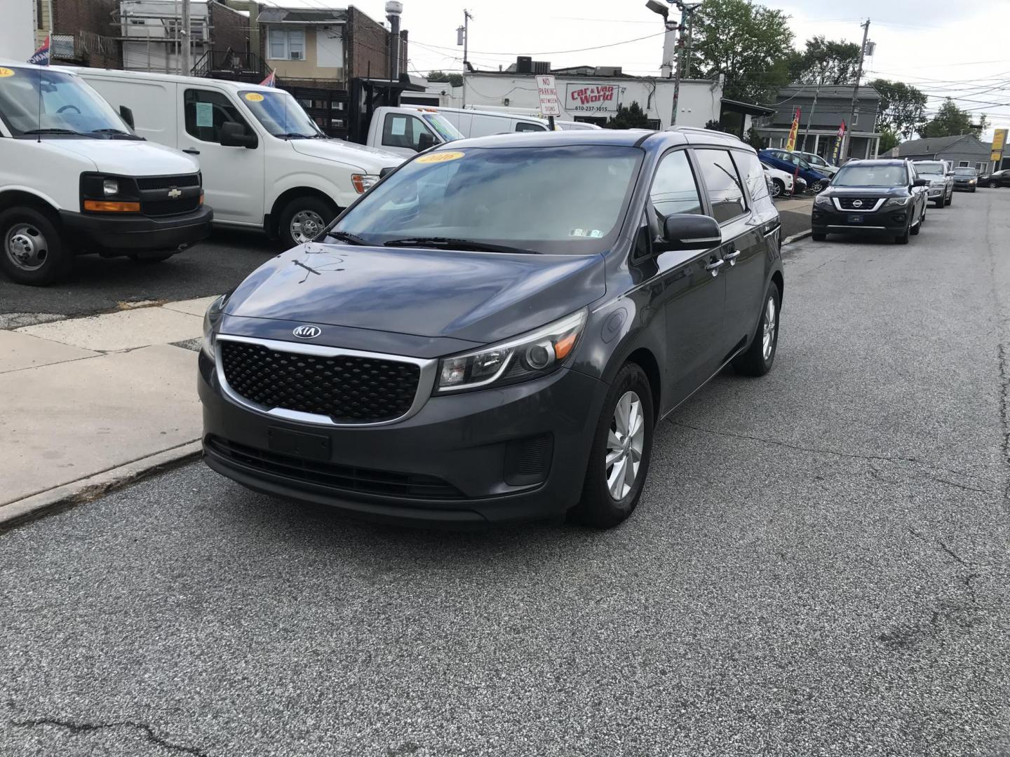 2016 Gray /Gray Kia Sedona LX (KNDMB5C16G6) with an 3.3L V6 DOHC 24V engine, 6-Speed Automatic transmission, located at 577 Chester Pike, Prospect Park, PA, 19076, (610) 237-1015, 39.886154, -75.302338 - 2016 Kia Sedona: Only 111k miles, backup camera, new PA inspection, SUPER CLEAN, runs LIKE NEW! This vehicle comes inspected and has been given a bumper to bumper safety check. It is very clean, reliable, and well maintained. We offer a unique pay plan that is known for being the easiest and fast - Photo#2