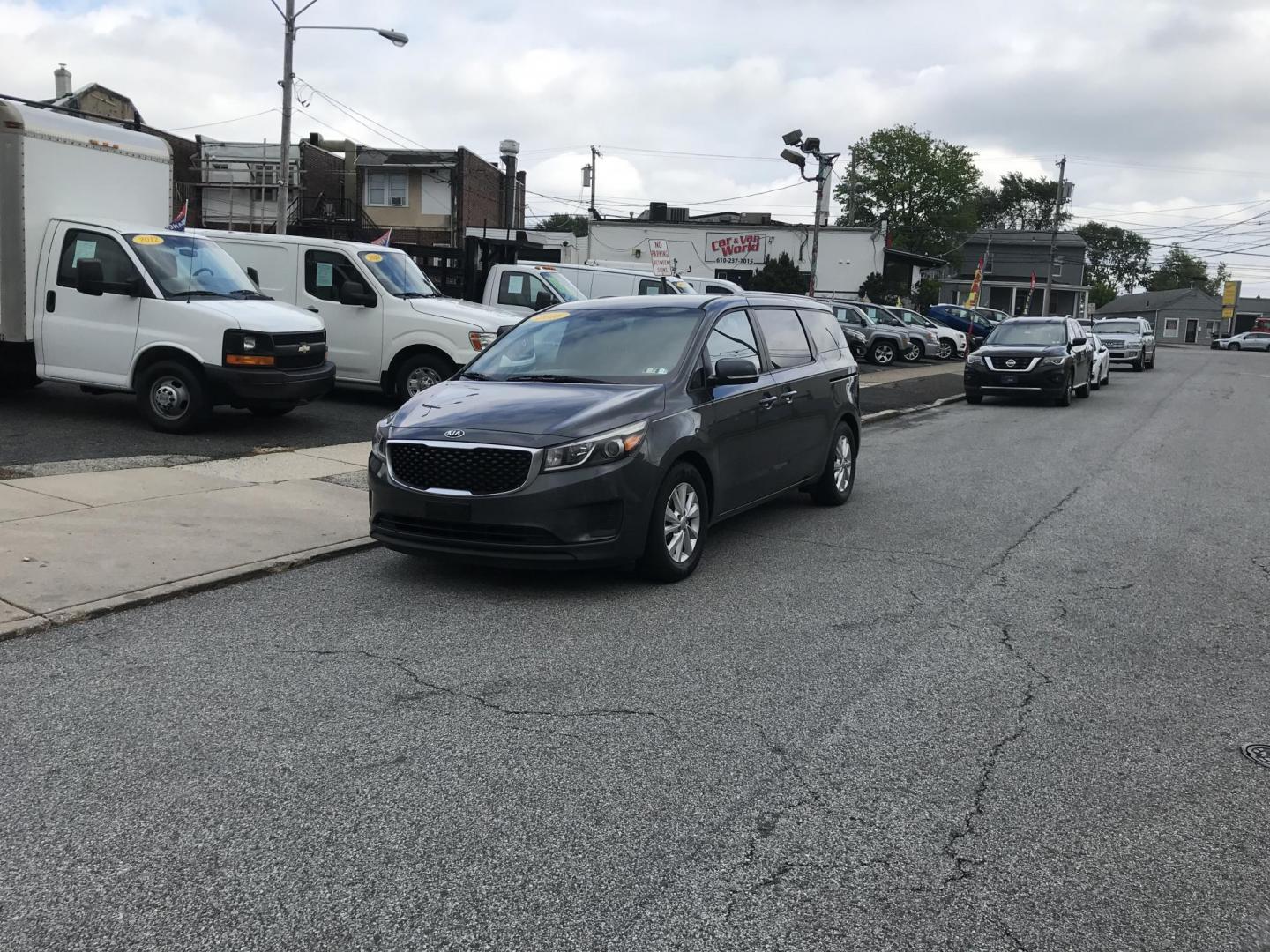 2016 Gray /Gray Kia Sedona LX (KNDMB5C16G6) with an 3.3L V6 DOHC 24V engine, 6-Speed Automatic transmission, located at 577 Chester Pike, Prospect Park, PA, 19076, (610) 237-1015, 39.886154, -75.302338 - 2016 Kia Sedona: Only 111k miles, backup camera, new PA inspection, SUPER CLEAN, runs LIKE NEW! This vehicle comes inspected and has been given a bumper to bumper safety check. It is very clean, reliable, and well maintained. We offer a unique pay plan that is known for being the easiest and fast - Photo#1