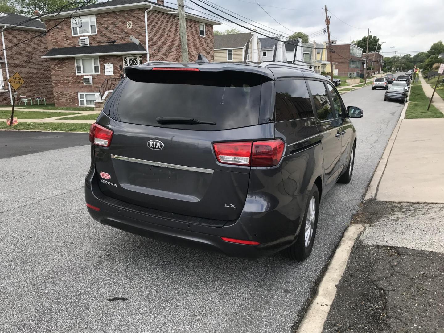 2016 Gray /Gray Kia Sedona LX (KNDMB5C16G6) with an 3.3L V6 DOHC 24V engine, 6-Speed Automatic transmission, located at 577 Chester Pike, Prospect Park, PA, 19076, (610) 237-1015, 39.886154, -75.302338 - 2016 Kia Sedona: Only 111k miles, backup camera, new PA inspection, SUPER CLEAN, runs LIKE NEW! This vehicle comes inspected and has been given a bumper to bumper safety check. It is very clean, reliable, and well maintained. We offer a unique pay plan that is known for being the easiest and fast - Photo#4